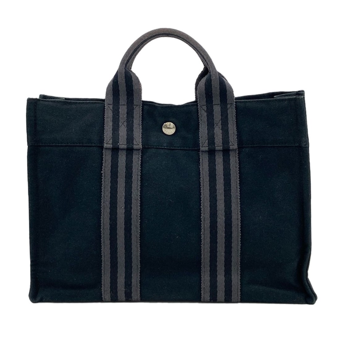 Sack Fool Toepm Tote Bag Canvas Hermes: Sack Fool Toepm Tote Bag Canvas Hermes Black canvas tote bag bearing a signature, made by the renowned brand HERMES. This stylish tote bag is crafted from high-quality canvas and features a sleek