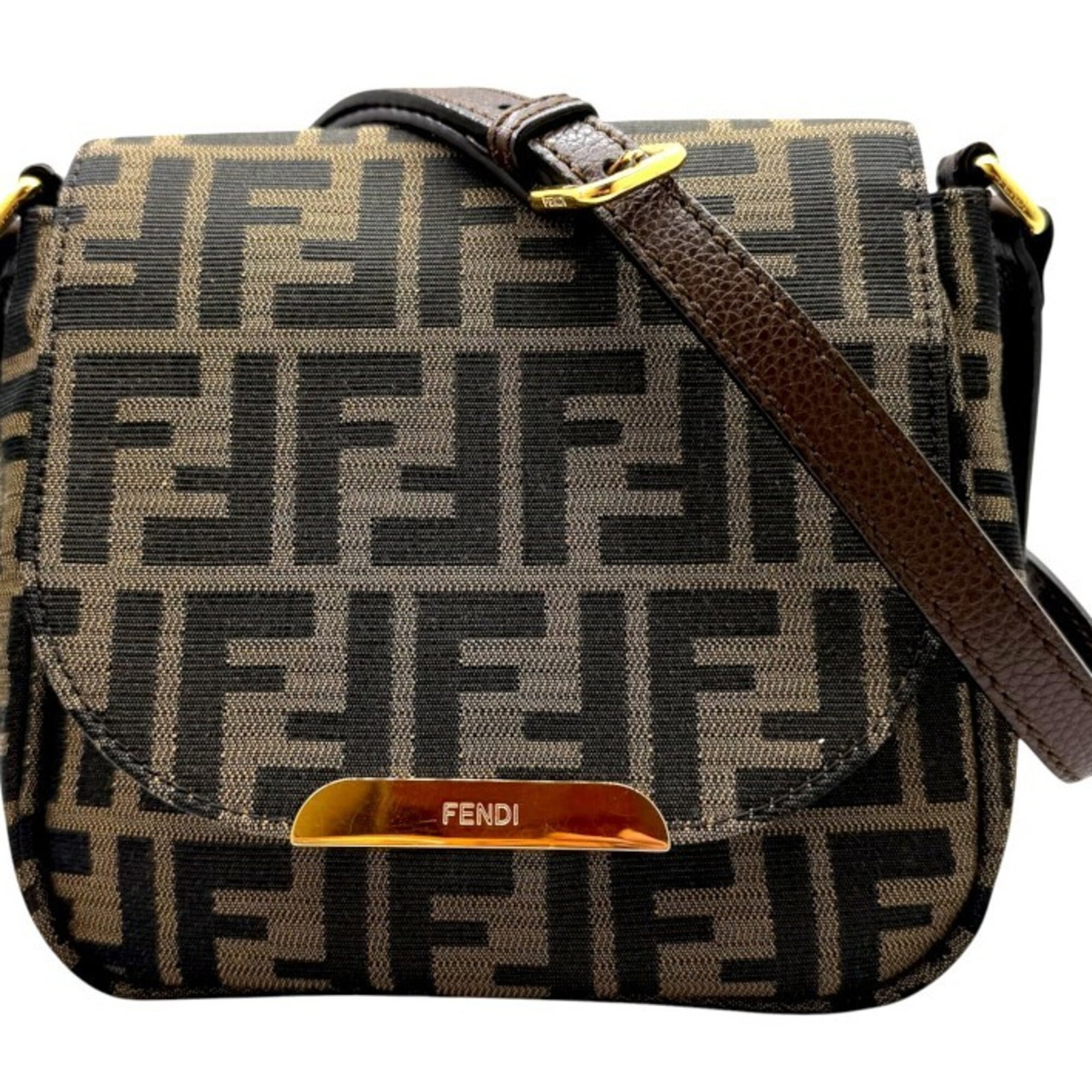 Shoulder Bag Fendi Canvas Leather: Shoulder Bag Fendi Canvas Leather Canvas and leather combine in this Fendi Zucca shoulder bag, offering a unique blend of materials and style. With a brown color and adjustable strap length, this bag