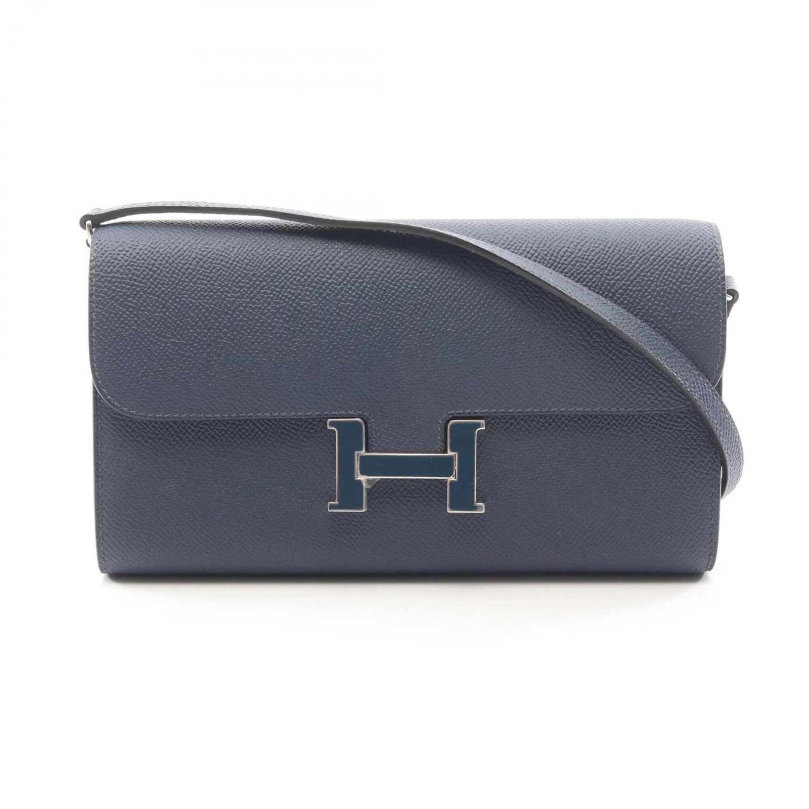 Handbag Epsom Leather Shoulder Hermes: Handbag Epsom Leather Shoulder Hermes Epsom leather, a rich and supple material, is used to craft this navy shoulder bag from the Hermes brand. Measuring 12cm x 20.5cm x 3cm, the bag's compact size ma