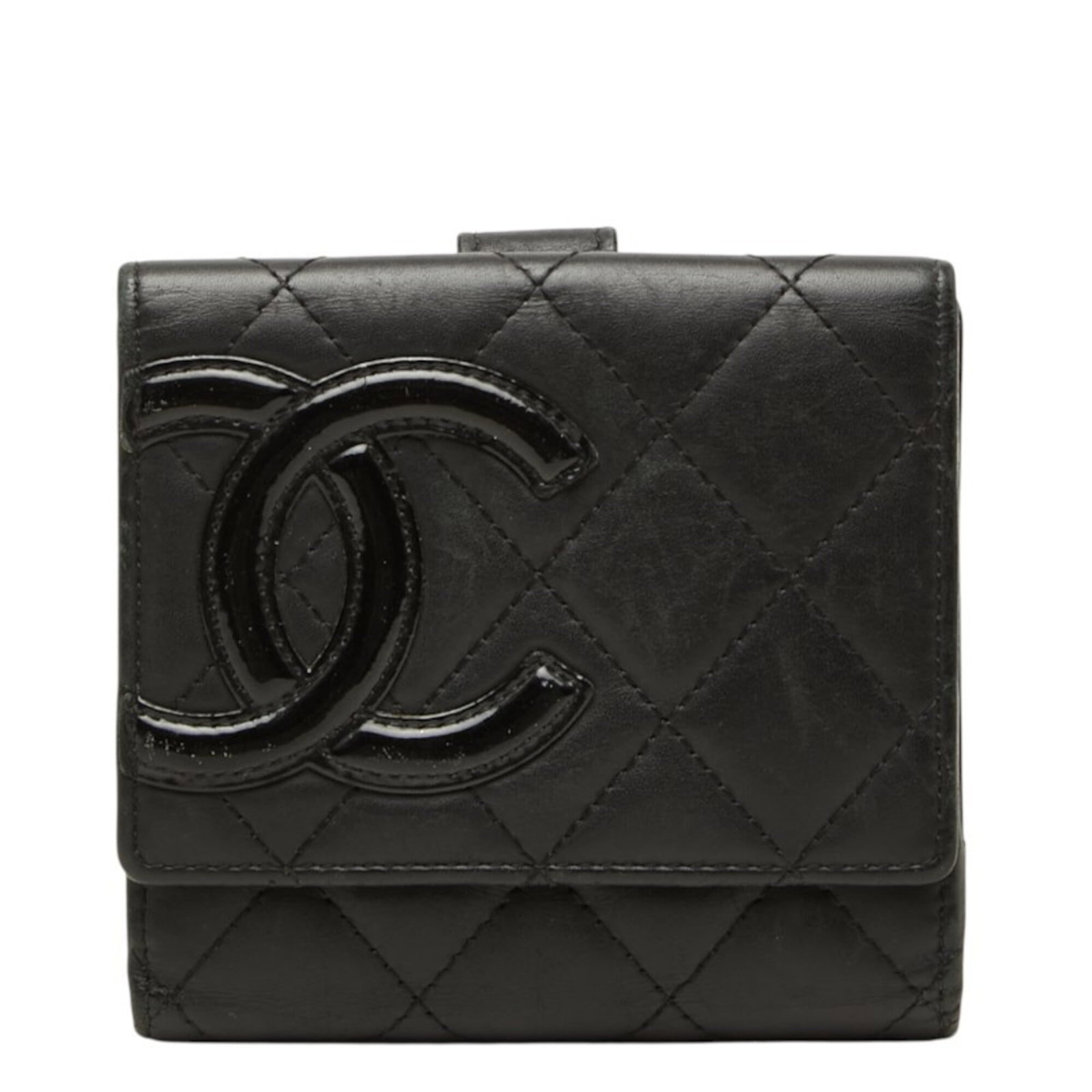 Chanel Wallet (Bi-Fold) Leather: Chanel Wallet (Bi-Fold) Leather Black leather bi-fold wallet from Chanel, measuring 10cm x 10.5cm x 1cm. This sleek and classic design is a timeless addition to any handbag collection. Its simple yet
