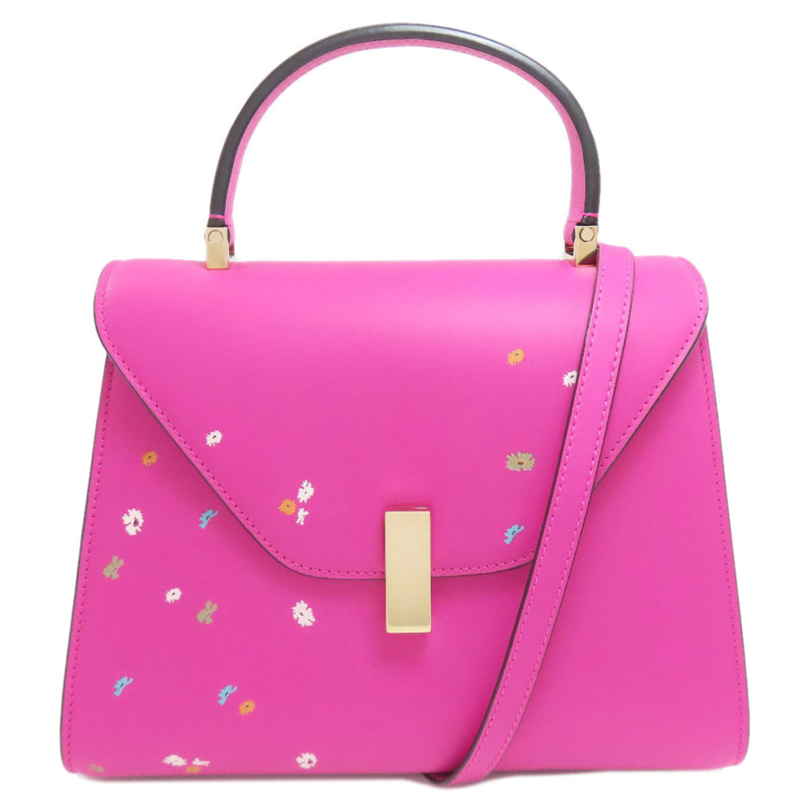 Handbag Leather Valextra: Handbag Leather Valextra The Valextra handbag is crafted from high-quality calfskin leather, featuring a distinctive pink hue. Measuring 19cm x 25.5cm x 13cm, this stylish accessory is designed to add