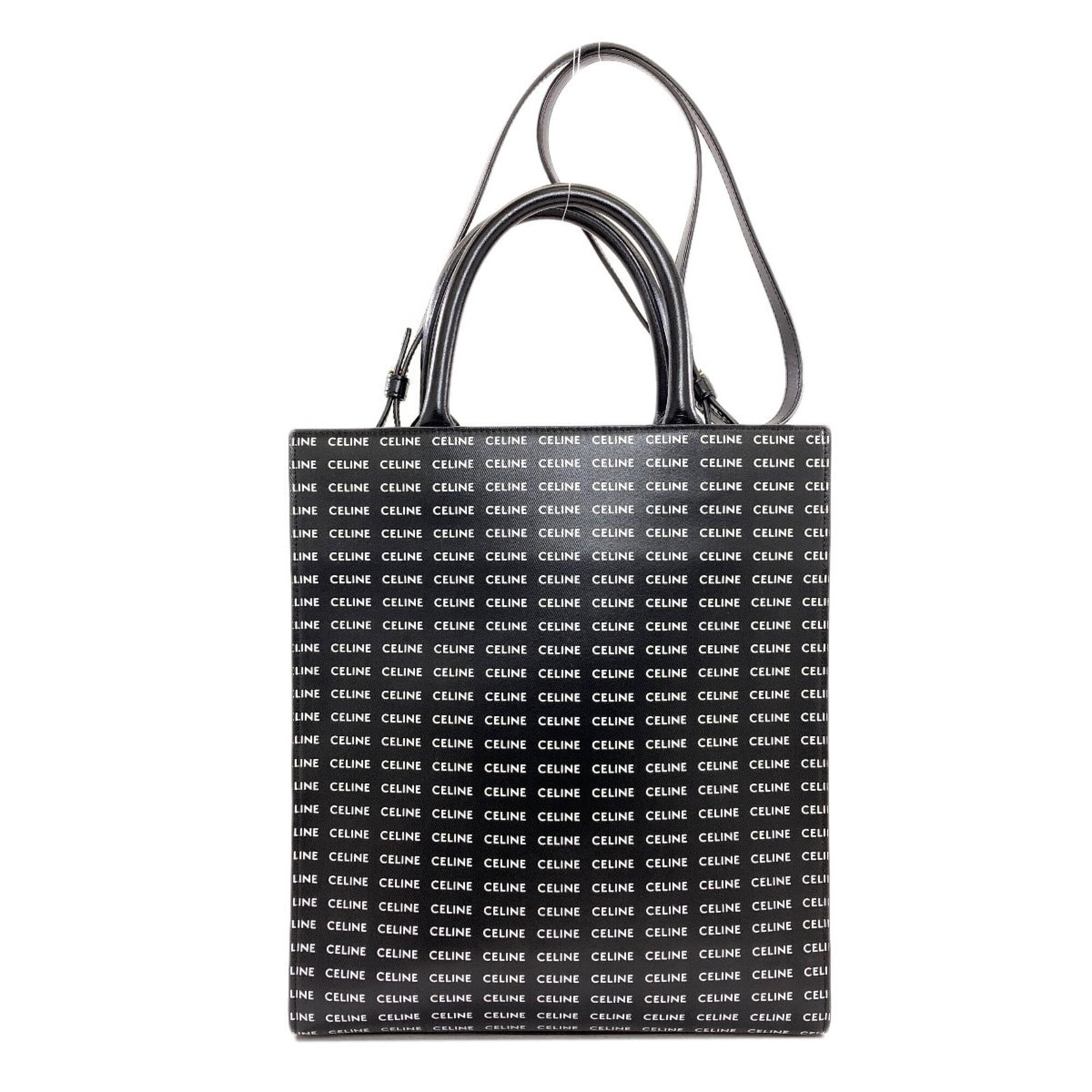 Celine Handbag Pvc: Celine Handbag Pvc Black PVC Celine Handbag with Ball Clasp. Made from high-quality PVC, this sleek and stylish handbag features a classic design with a secure ball clasp closure. Perfectly sized at