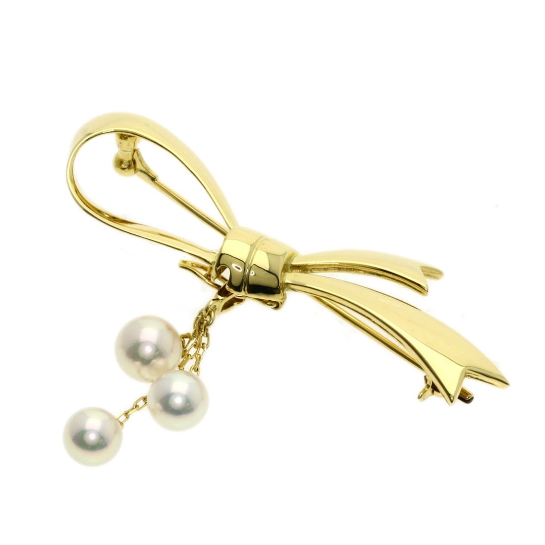 K18 Yellow Gold Pearl Mikimoto Brooch Ribbon: K18 Yellow Gold Pearl Mikimoto Brooch Ribbon K18 Yellow Gold Pearl Mikimoto Brooch Ribbon is a stunning piece featuring a high-quality K18 yellow gold setting, showcasing a beautiful pearl. The brooch