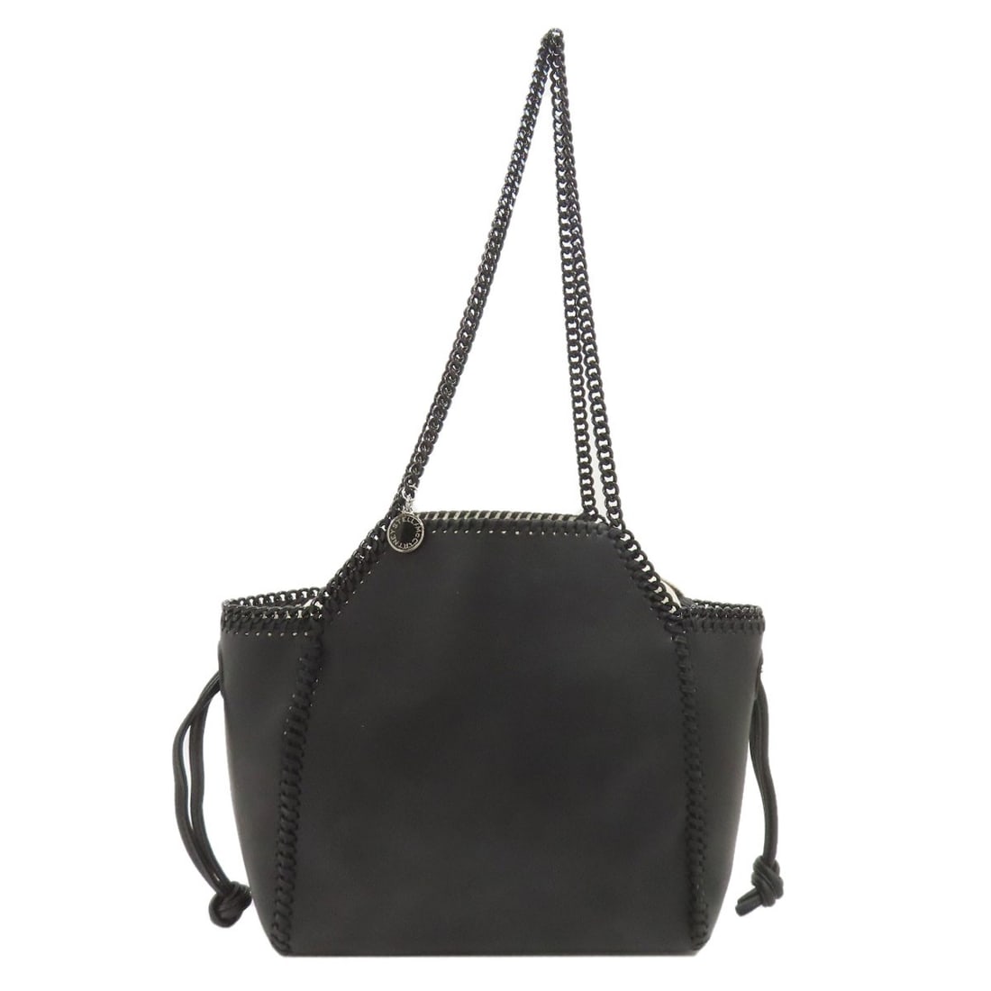 Falabella Polyester McCartney Stella Tote Bag: Falabella Polyester McCartney Stella Tote Bag Black polyester tote bag with a classic style inspired by Stella McCartney. This tote bag features a simple yet elegant design, made from high-quality pol