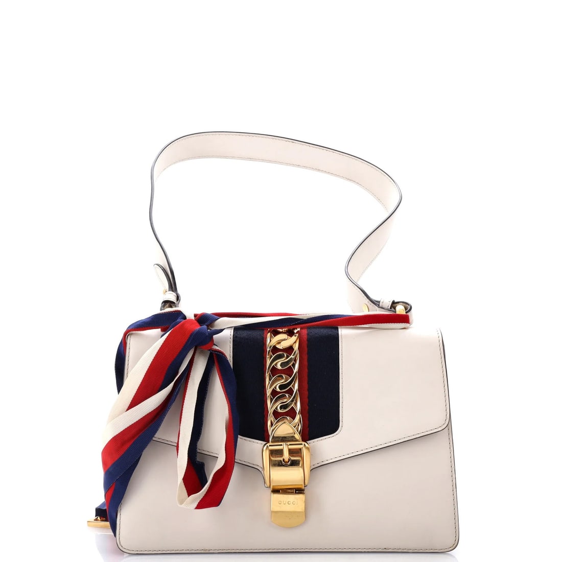 Small Leather Bag Sylvie Gucci: Small Leather Bag Sylvie Gucci Small Leather Bag Sylvie Gucci in White. This small shoulder bag features a white leather exterior with a neutral microfiber interior, gold hardware, and a sturdy gold s