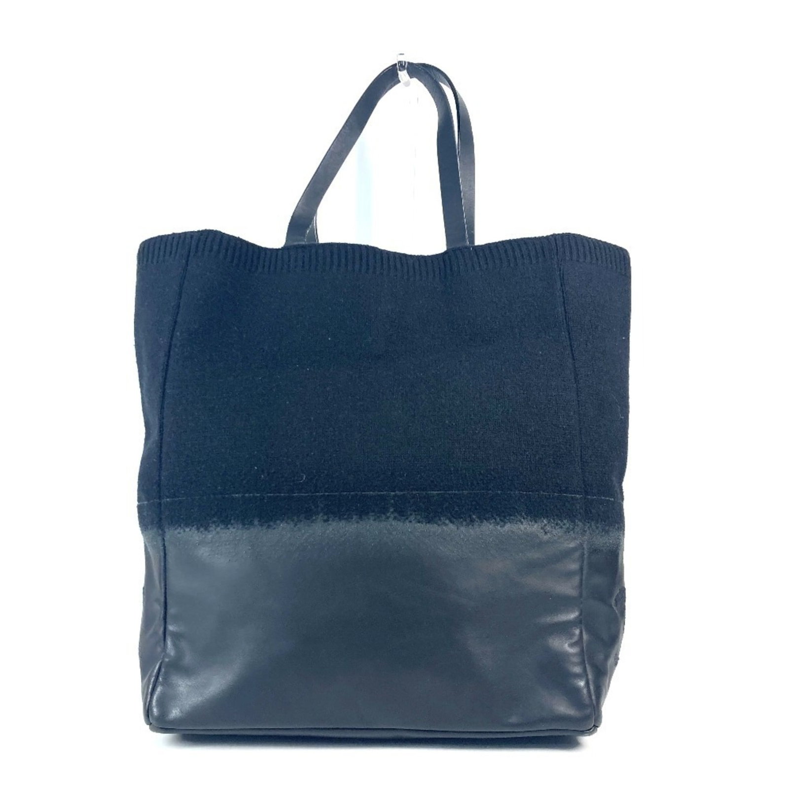 Chanel Knit Leather Tote Bag Shoulder: Chanel Knit Leather Tote Bag Shoulder Black Chanel Knit Leather Tote Bag with a classic shoulder design, measuring 41cm x 34cm x 15.5cm. This stylish tote features a unique knit leather material and