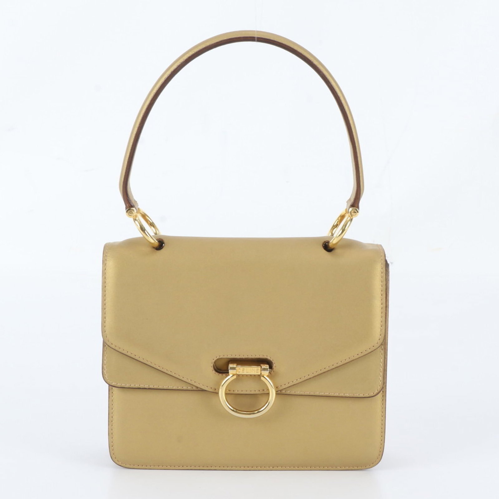 Celine Handbag Leather: Celine Handbag Leather Gold Celine handbag made from high-quality leather, measuring 17cm x 18cm x 5cm. This stylish bag boasts a sleek design and premium leather construction. Its classic gold color