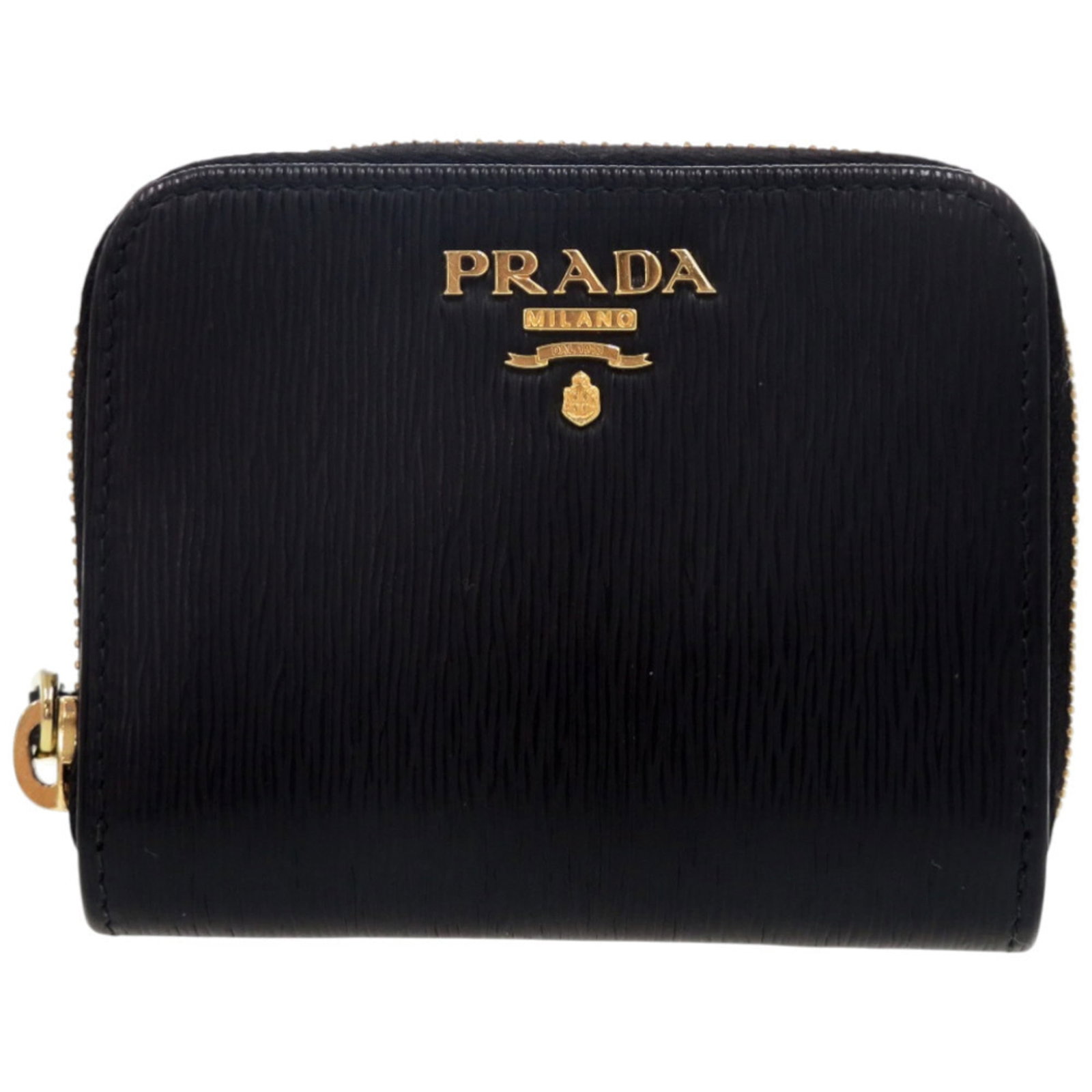 Coin purse case leather: Coin purse case leather Black leather coin purse case from Prada, measuring 8.5cm x 10cm x 2cm. Made from high-quality leather, this compact case features a sleek design and a classic black color.