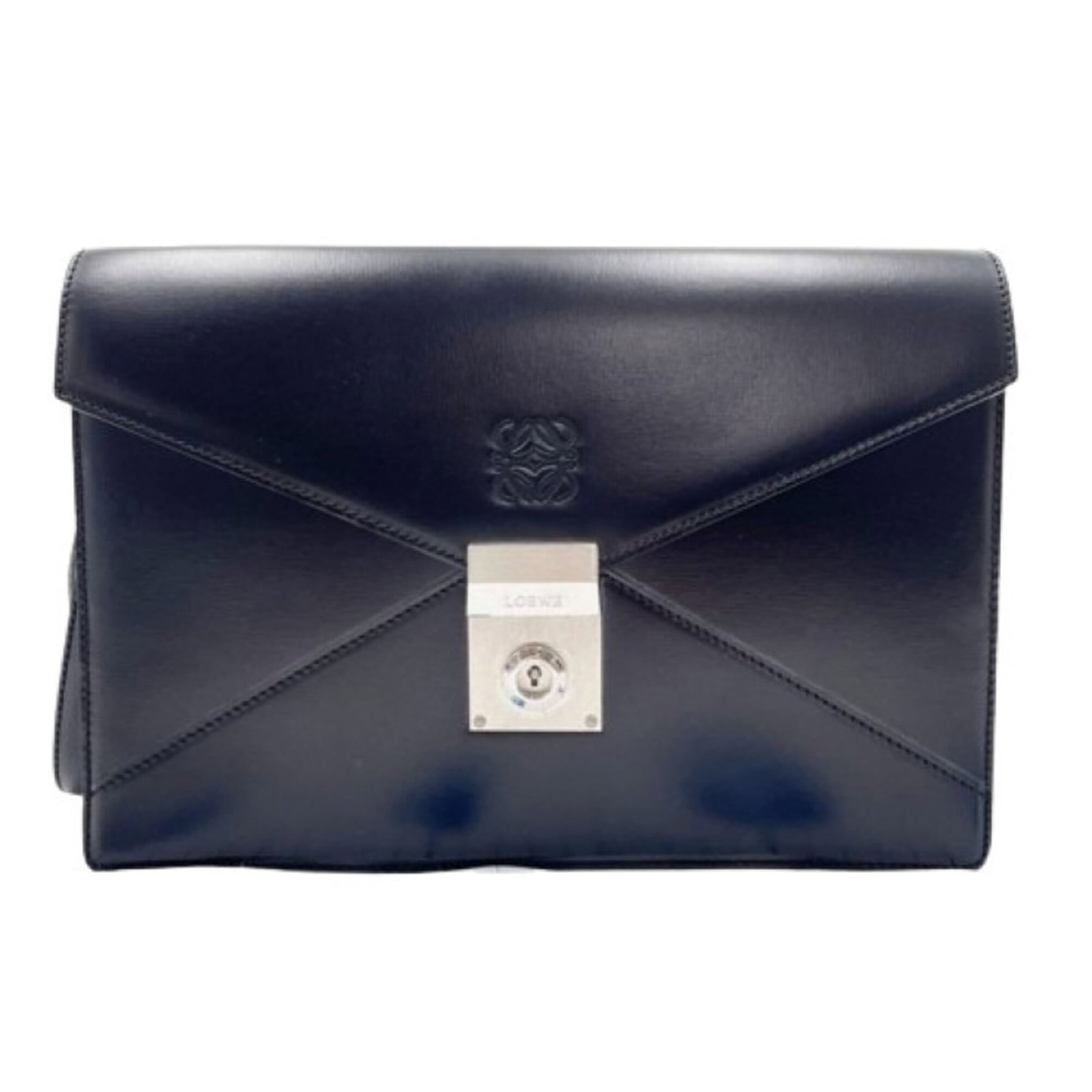 Loewe Clutch Bag Leather: Loewe Clutch Bag Leather Black leather clutch bag from Loewe, marked with serial number on the body, measuring 18.5cm x 26cm x 6cm. Made from high-quality leather and featuring silver hardware, this c