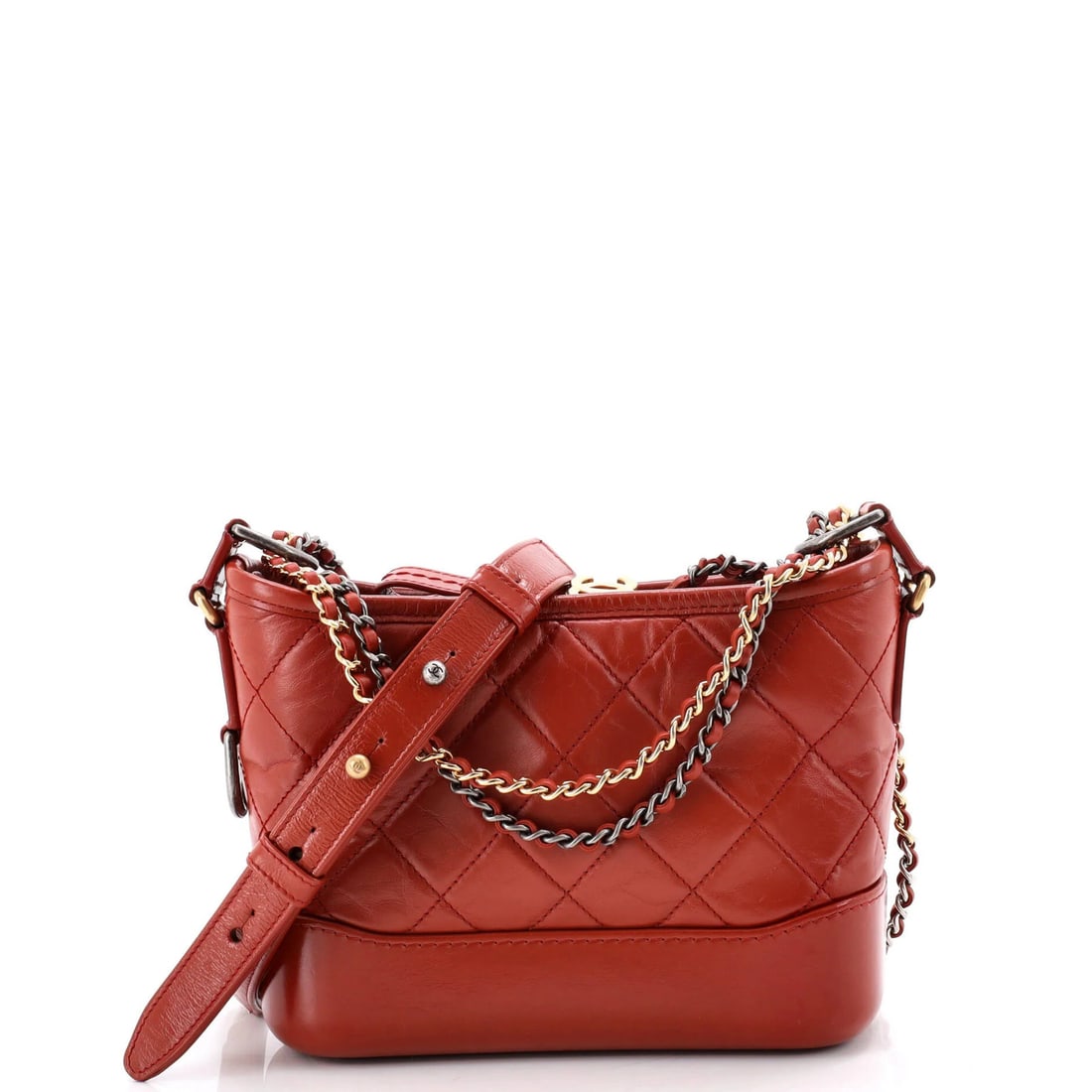 Calfskin Quilted Aged Small Hobo By Gabrielle Chanel: Calfskin Quilted Aged Small Hobo By Gabrielle Chanel Small, quilted, and aged to perfection, this Calfskin Hobo by Gabrielle Chanel boasts a rich, brown exterior and a subtle red interior. Minor scuff