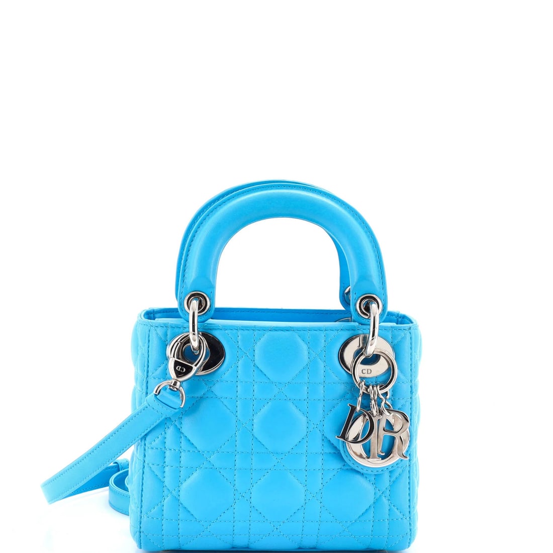 Cannage Quilt Lambskin Mini Lady Dior Christian Dior Bag: Cannage Quilt Lambskin Mini Lady Dior Christian Dior Bag The Cannage Quilt Lambskin Mini Lady Dior is a stunning miniature version of the iconic Christian Dior bag, featuring a beautiful blue