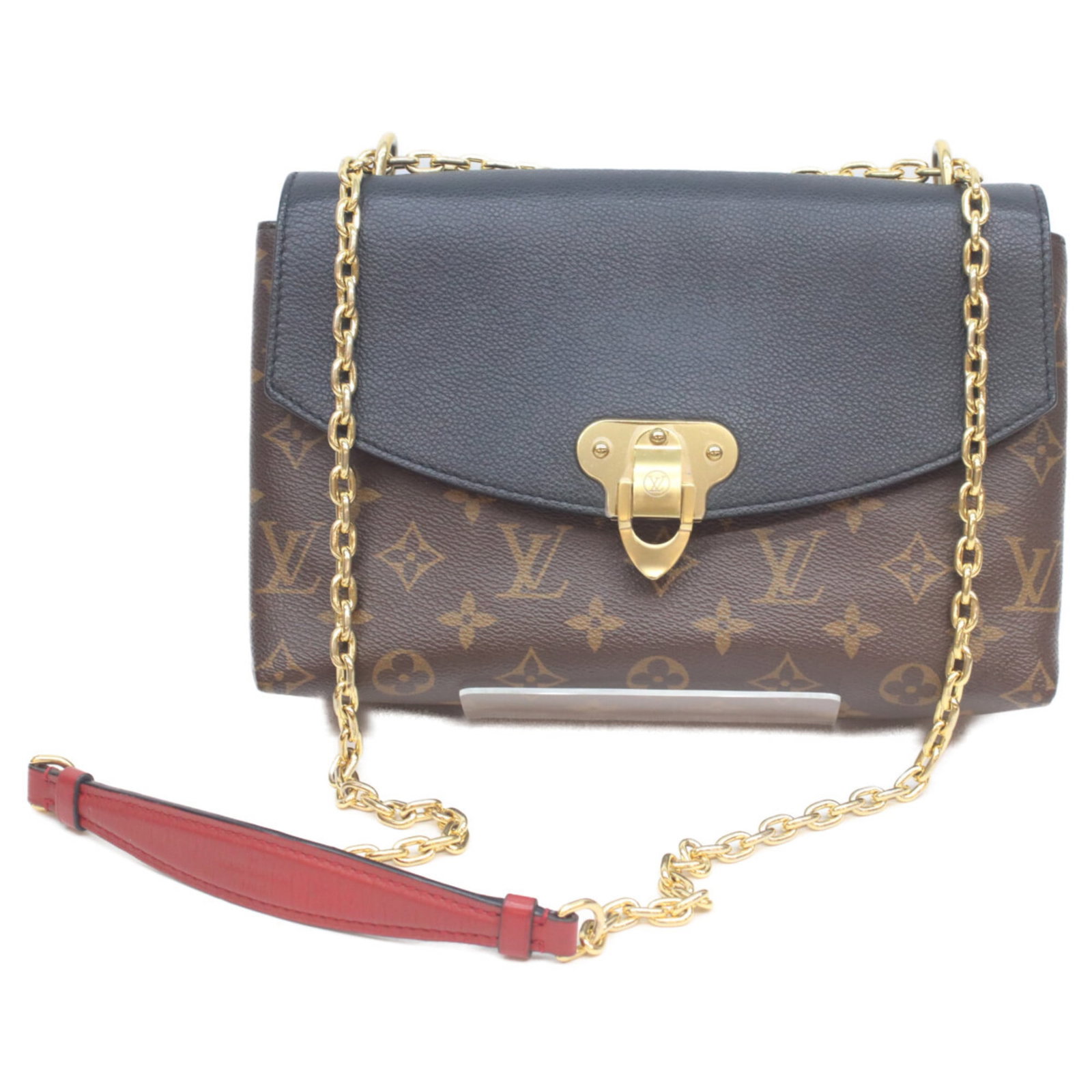 Shoulder Bag Monogram Louis Vuitton: Shoulder Bag Monogram Louis Vuitton Black and Brown Monogram Louis Vuitton Shoulder Bag. This shoulder bag features the iconic monogram pattern in both black and brown colors, adding a touch of elegan