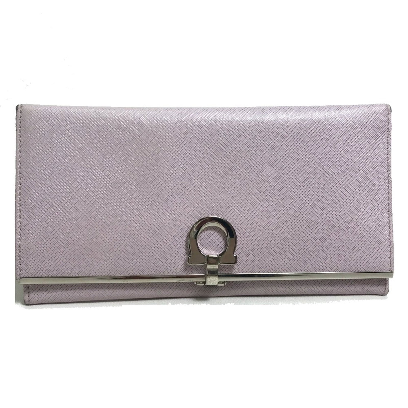 Salvatore Ferragamo Long Wallet (Bi-Fold) Leather: Salvatore Ferragamo Long Wallet (Bi-Fold) Leather Purple leather bi-fold wallet from Salvatore Ferragamo, measuring 19cm x 10cm and 7.5cm x 3.9cm. This long wallet features a classic design with a ric