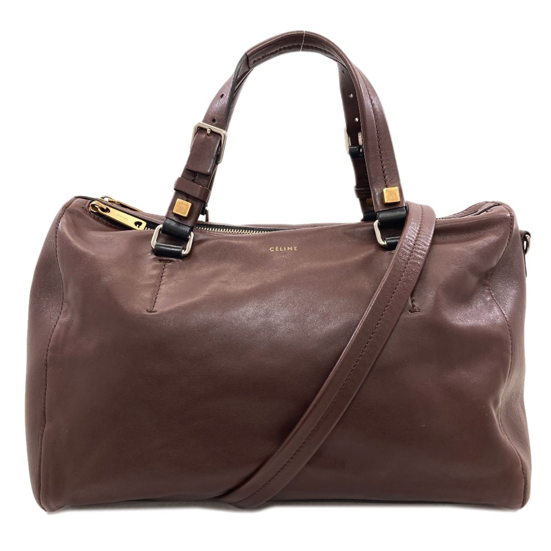 Celine Handbag Leather: Celine Handbag Leather Brown leather handbag from CELINE, featuring a classic style with a rich, brown exterior. The bag's exterior is made of high-quality leather, providing a durable and long-lastin