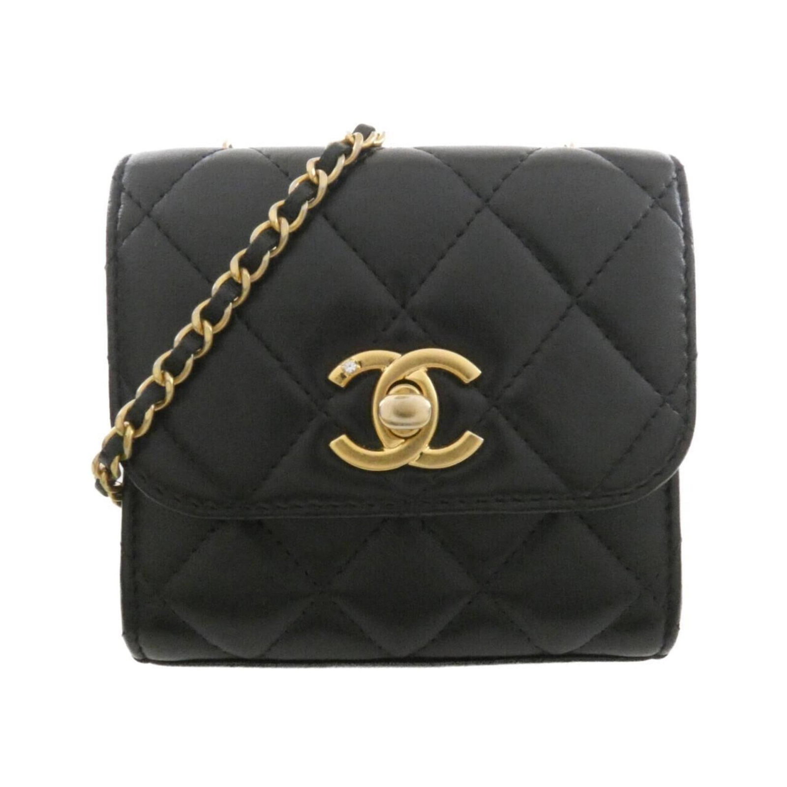 Shoulder Bag by Chanel: Shoulder Bag by Chanel Black Chanel shoulder bag with dimensions 10cm x 11cm x 3cm. This sleek and compact bag features a classic design that exudes timeless elegance. Its understated size makes it a