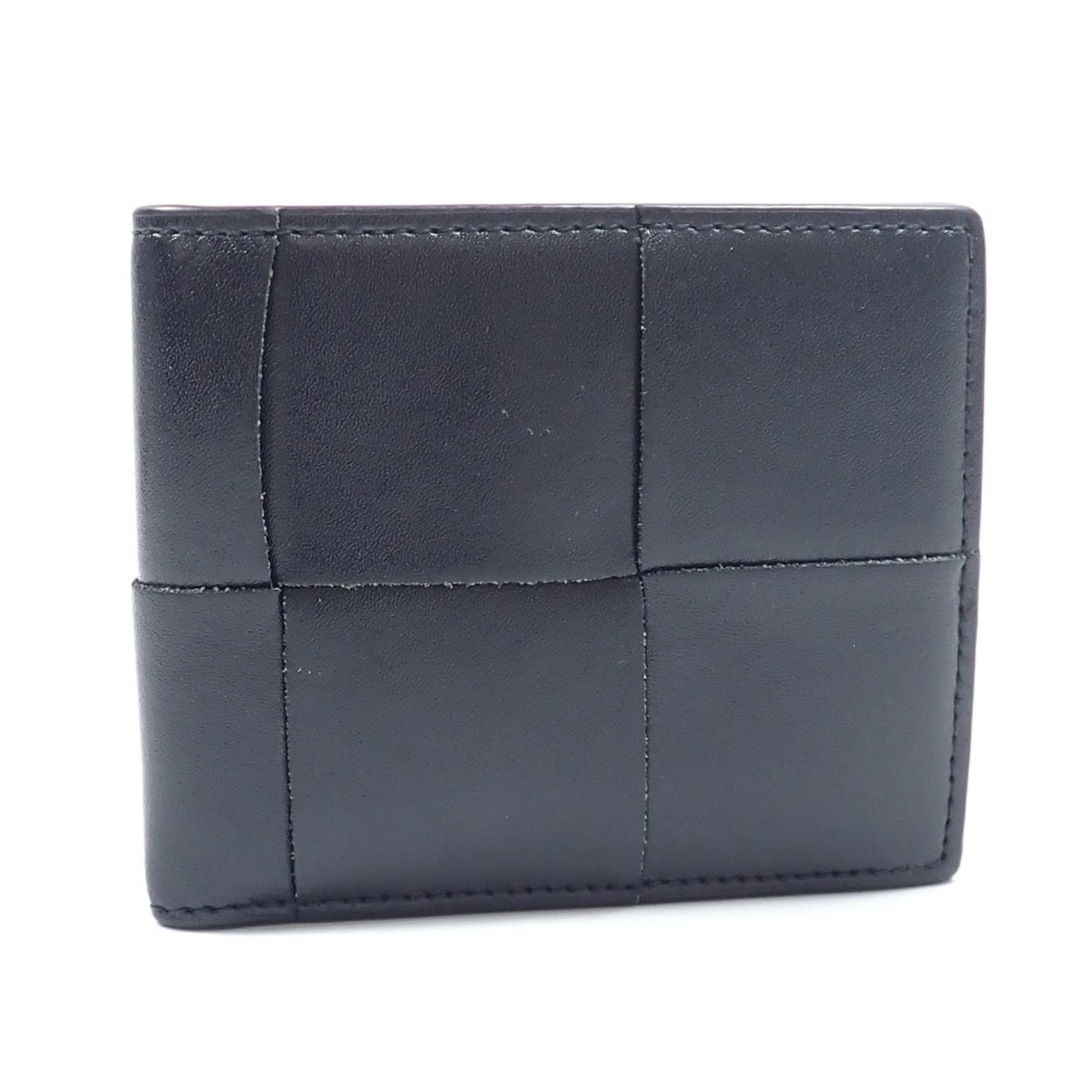 Bottega Veneta Wallet (Bi-Fold) Leather: Bottega Veneta Wallet (Bi-Fold) Leather Bottega Veneta's bi-fold leather wallet features sleek black leather and a compact design, perfect for everyday carry. With its 9cm x 10.5cm x 1.5cm