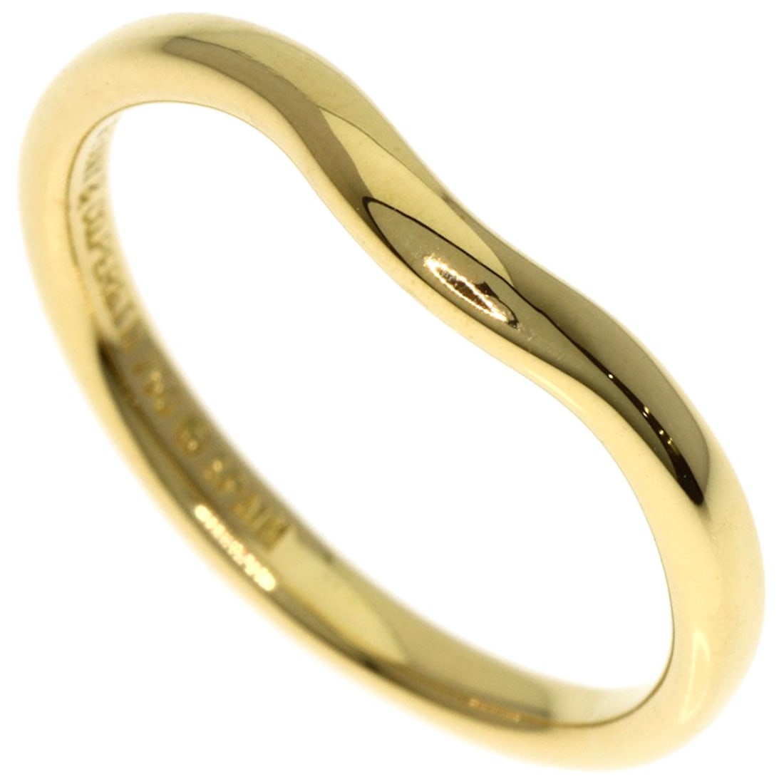 Tiffany&Co Curved Gold K18 Yellow Ring Band: Tiffany&Co Curved Gold K18 Yellow Ring Band K18 Yellow Gold Curved Ring Band from Tiffany&Co. Features a curved design made from 18K yellow gold, with a ring size of 4.25(US). This piece bears a