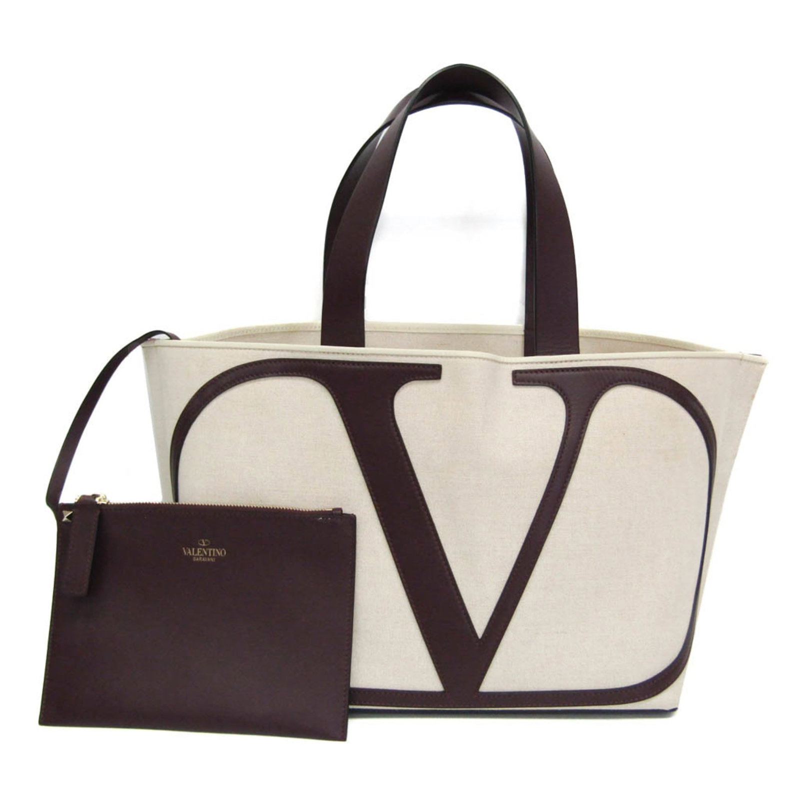 Garavani Valentino Leather Canvas Tote Bag: Garavani Valentino Leather Canvas Tote Bag Top-quality leather and canvas materials come together in this elegant Valentino Garavani tote bag, featuring a classic Bordeaux and cream color combination.