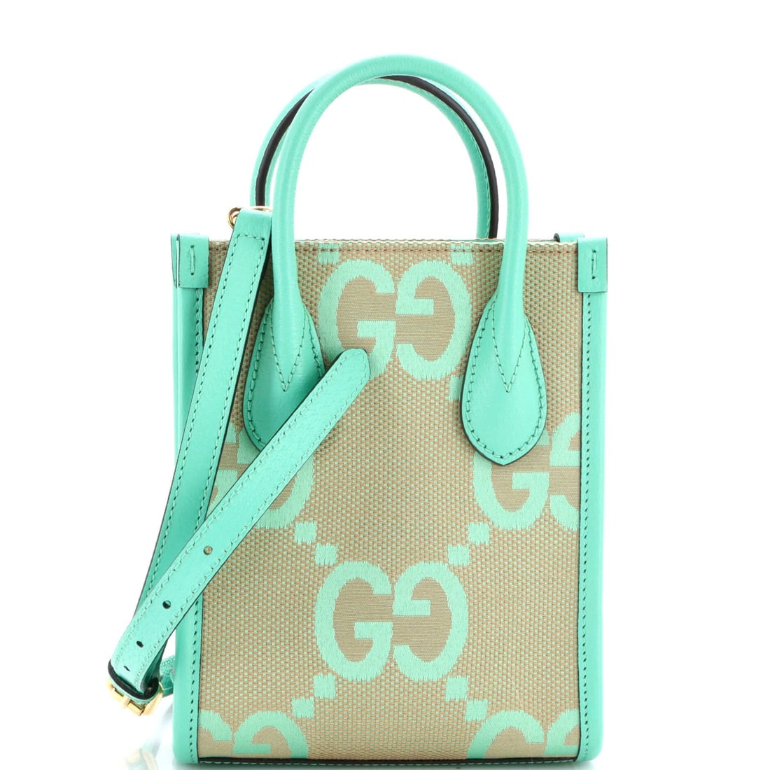 GG Canvas Mini Tote Vertical Gucci Jumbo: GG Canvas Mini Tote Vertical Gucci Jumbo Vertical Tote Jumbo in Green GG Canvas Mini. This stylish Gucci cross body bag features a mini size, vertical tote design, and a striking green exterior made f