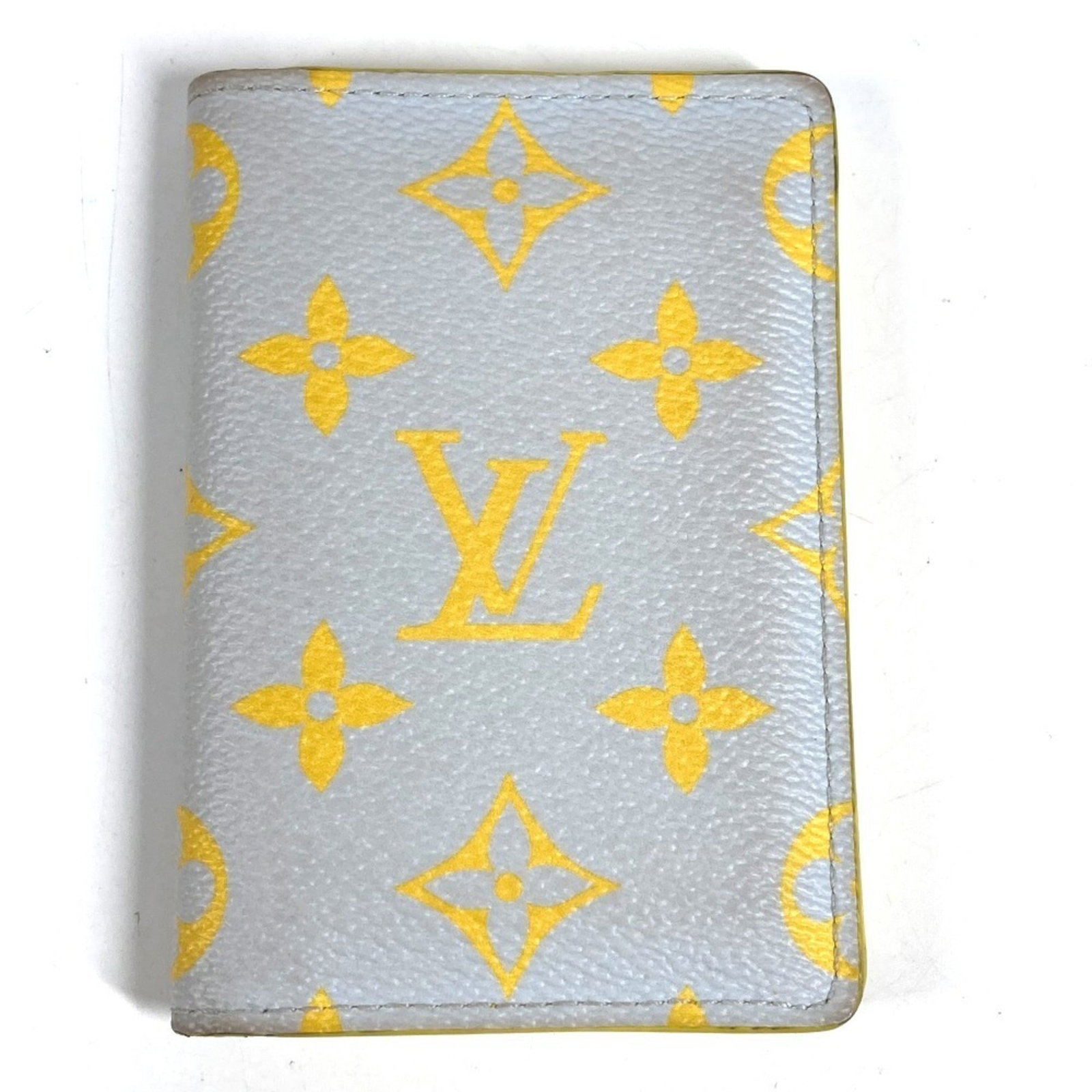 Card Case Leather Louis Vuitton: Card Case Leather Louis Vuitton Gray or Yellow Leather Louis Vuitton Card Case. Made from high-quality leather, this card case features the iconic Louis Vuitton design. With its classic style and time