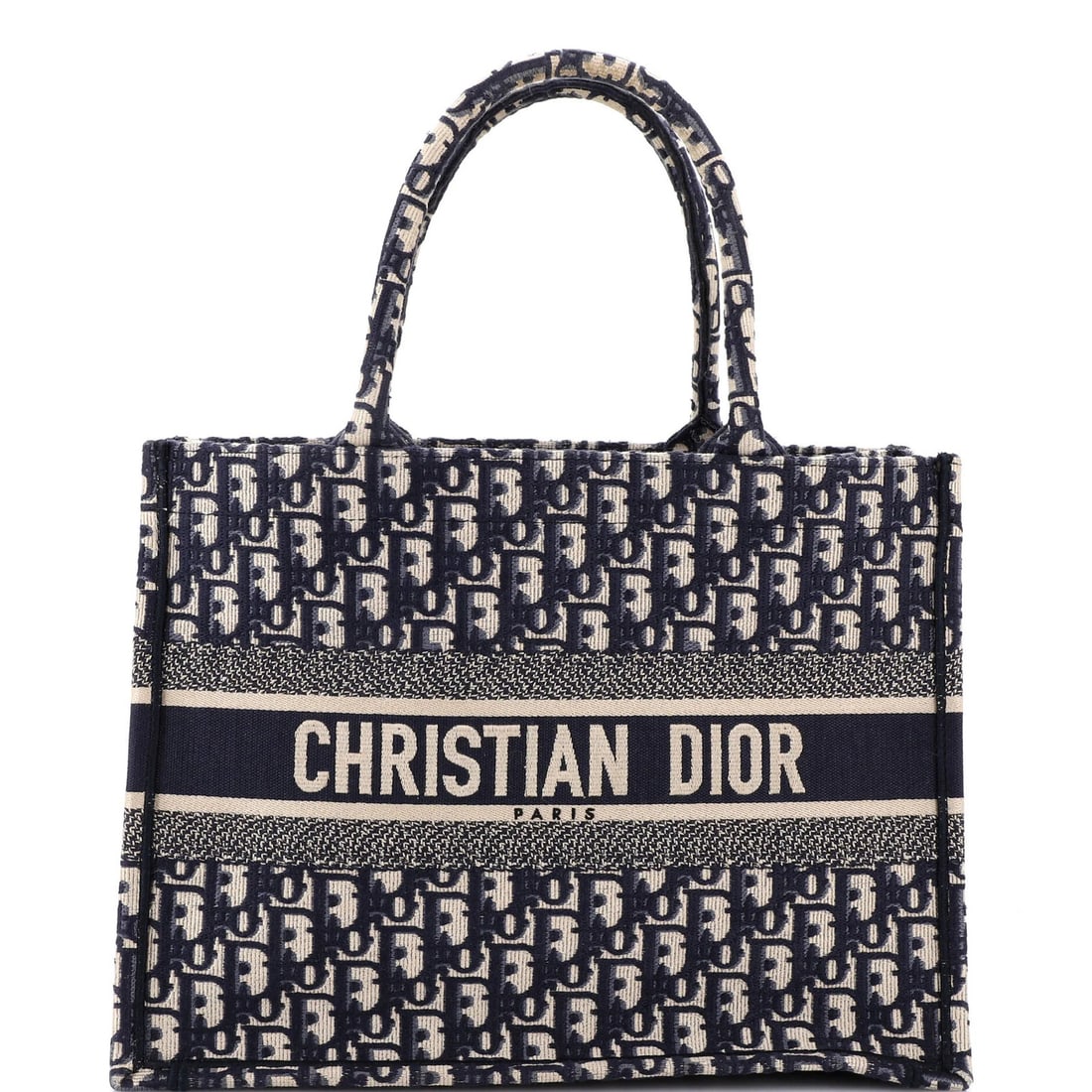 Dior Book Canvas Tote Oblique Medium Christian: Dior Book Canvas Tote Oblique Medium Christian This Christian Dior Book Tote Oblique in Medium size features a striking blue canvas exterior with a classic oblique design. The tote boasts a sturdy han
