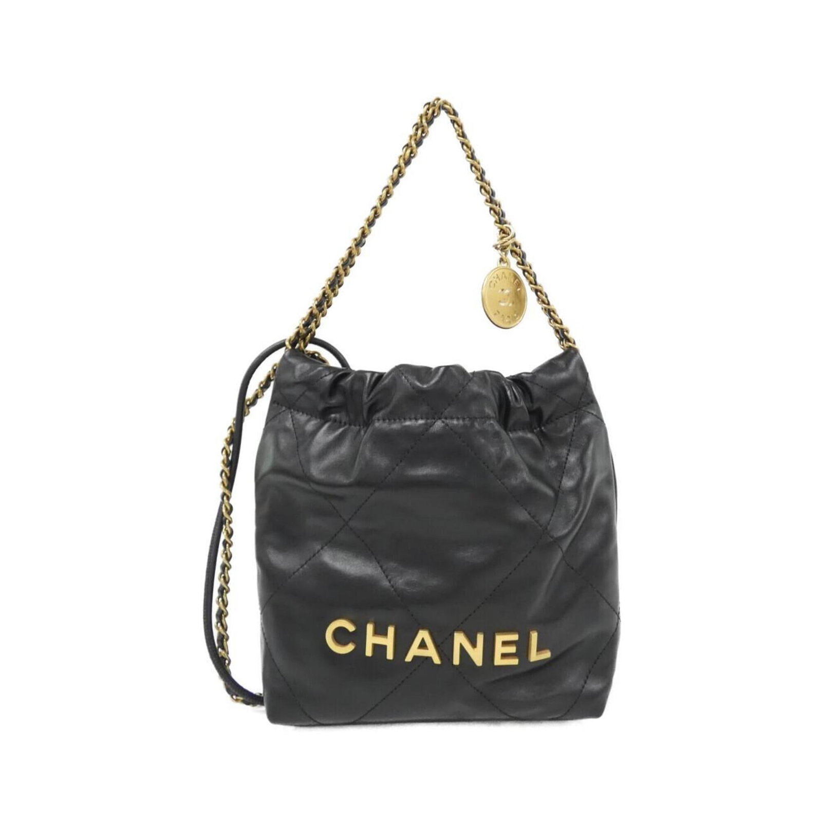 Handbag Leather from Chanel: Handbag Leather from Chanel This black Chanel handbag is crafted from high-quality calfskin leather, featuring a classic design with matte gold hardware. With its sleek dimensions of 19cm x 18cm x 6cm