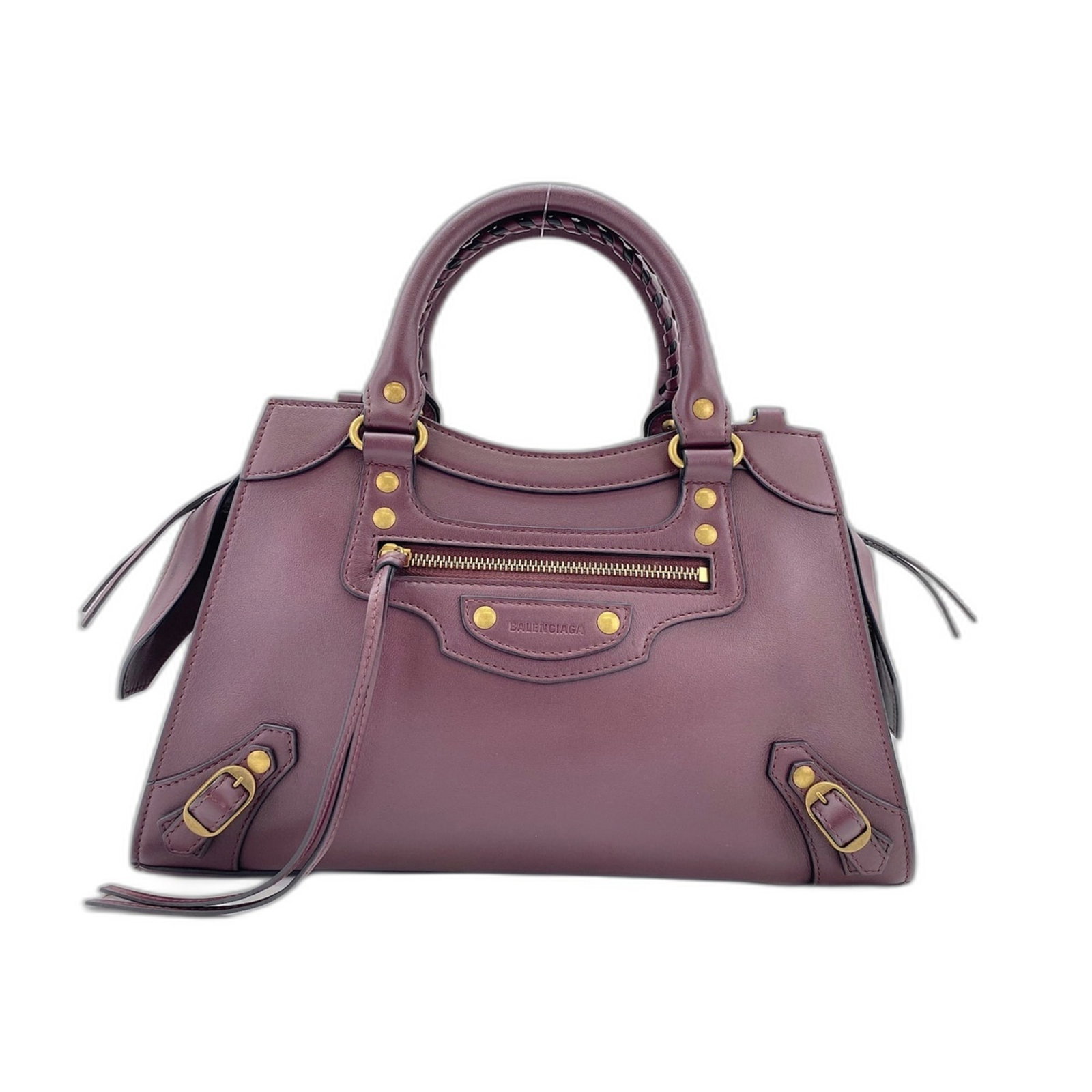 Balenciaga Handbag: Balenciaga Handbag Wine-colored Balenciaga handbag with classic design, measuring 19cm x 32cm x 13cm. This timeless piece boasts a sophisticated style that complements any wardrobe. Its elegant