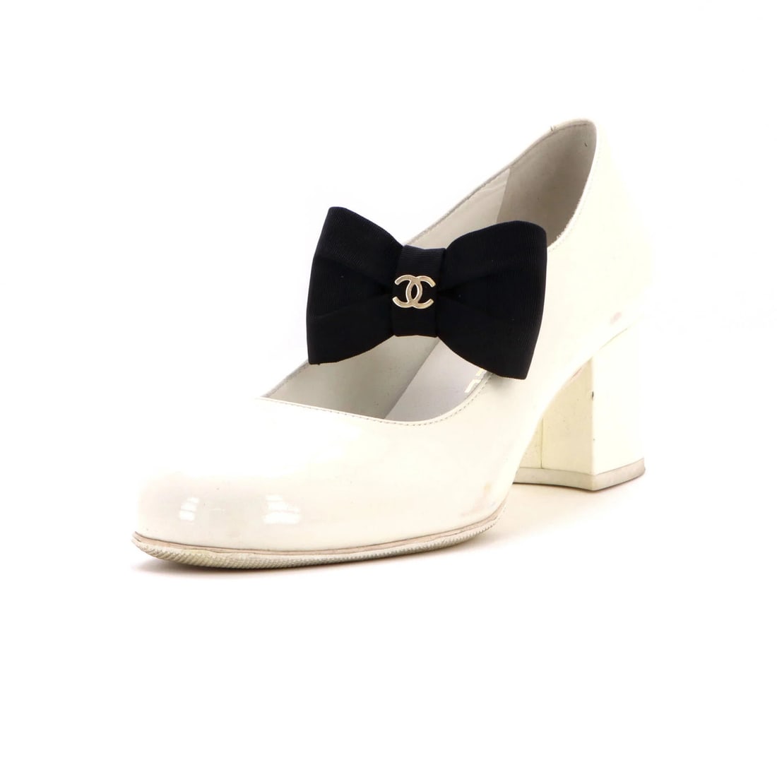 Mary Jane Pumps Patent Bow Chanel CC Women's: Mary Jane Pumps Patent Bow Chanel CC Women's Patent leather upper adds a touch of sophistication to these classic Mary Jane pumps. Resoled outer soles and a gold hardware detail give these shoes a pol