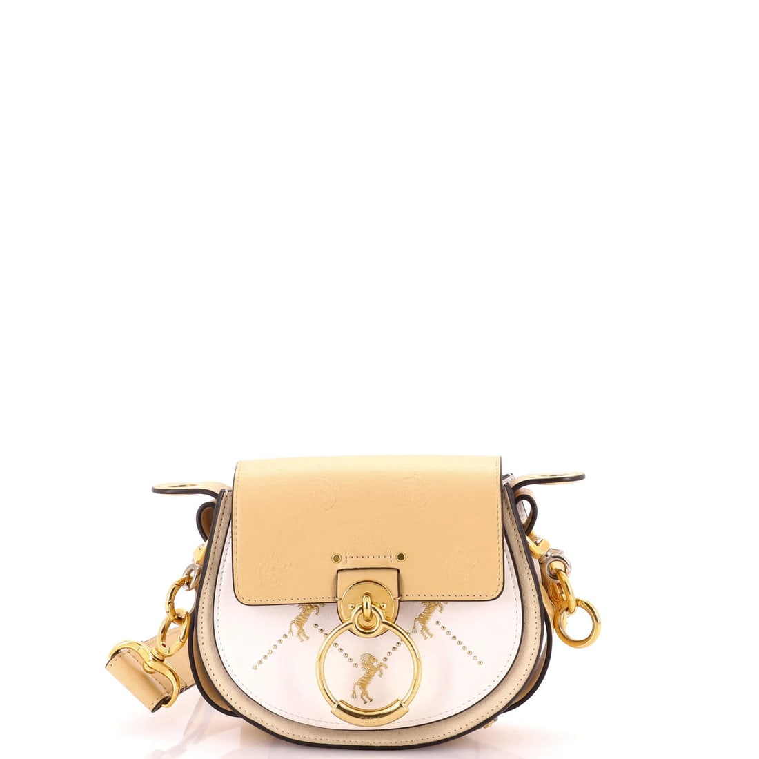 Small embroidered leather bag Tess Chloe: Small embroidered leather bag Tess Chloe Small embroidered leather bag with a neutral exterior and gold hardware, featuring a cross body design and adjustable strap. This stylish bag measures 6.5" tal