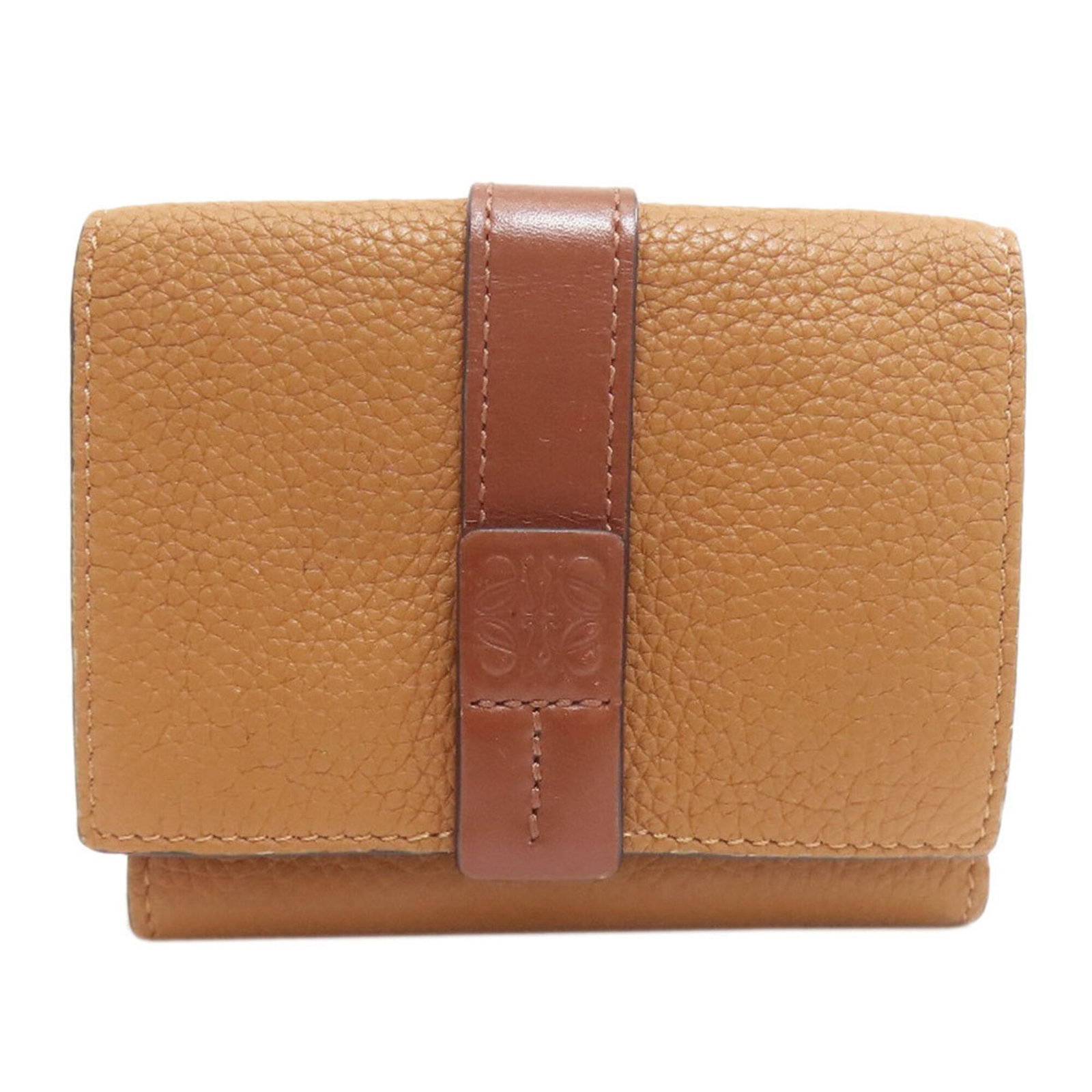 Loewe Wallet (Tri-Fold) Leather: Loewe Wallet (Tri-Fold) Leather Tri-fold leather wallet from renowned brand Loewe, featuring a classic design with clean lines and a timeless brown leather finish. Measuring 8cm x 9.5cm x 2cm, this