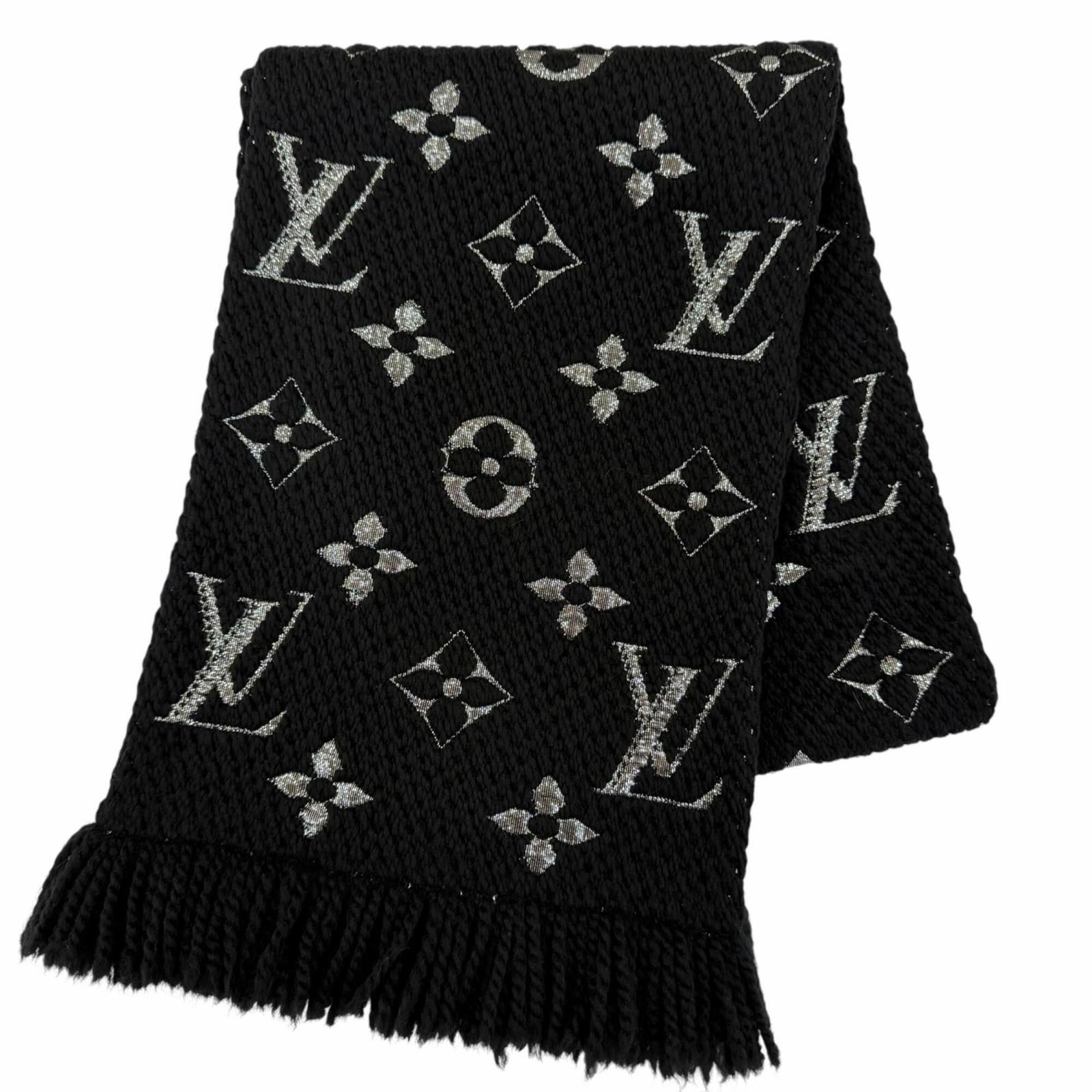 Silk Wool Polyester Stole Louis Vuitton: Silk Wool Polyester Stole Louis Vuitton Silk, wool, and polyester come together in this luxurious Louis Vuitton stole, crafted with a Noir color that adds a touch of sophistication to any outfit. Meas