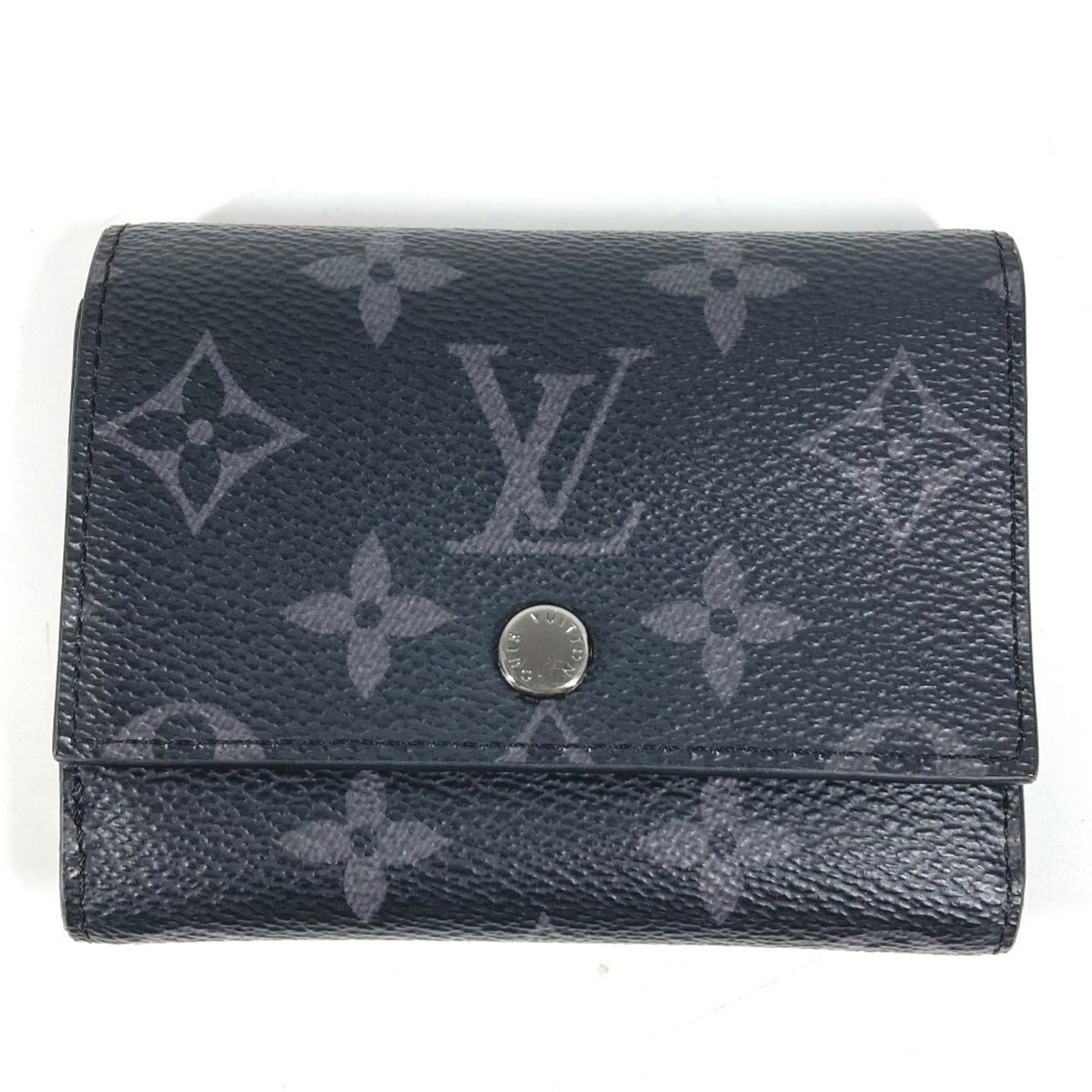 Louis Vuitton Wallet (Tri-Fold) Monogram Eclipse: Louis Vuitton Wallet (Tri-Fold) Monogram Eclipse Monogram Eclipse in Black, a sleek and sophisticated tri-fold wallet from Louis Vuitton. The iconic Monogram Eclipse pattern adds a touch of elegance