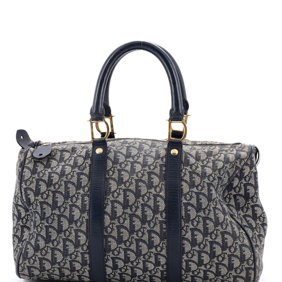 Christian Dior Vintage Trotter Boston Diorissimo Medium Canvas Bag: Christian Dior Vintage Trotter Boston Diorissimo Medium Canvas Bag The Christian Dior Vintage Trotter Boston Diorissimo Medium Canvas Bag is a unique and stylish piece from the 1960s. This
