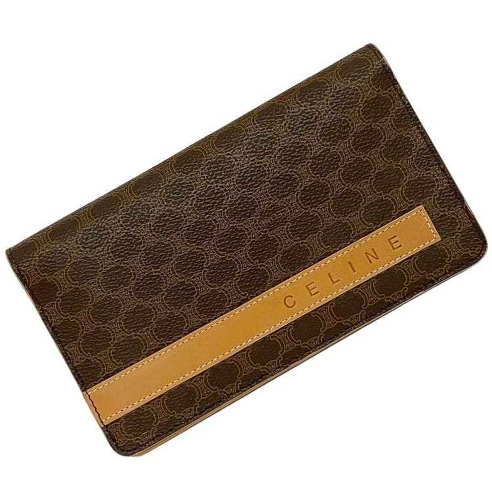Bi Fold Pvc Celine Wallet: Bi Fold Pvc Celine Wallet Bi-fold wallet with a sturdy PVC construction, available in brown, and featuring an open closure. Measuring 10.5cm x 18cm x 2cm, it comes in a box and is part of the Celine