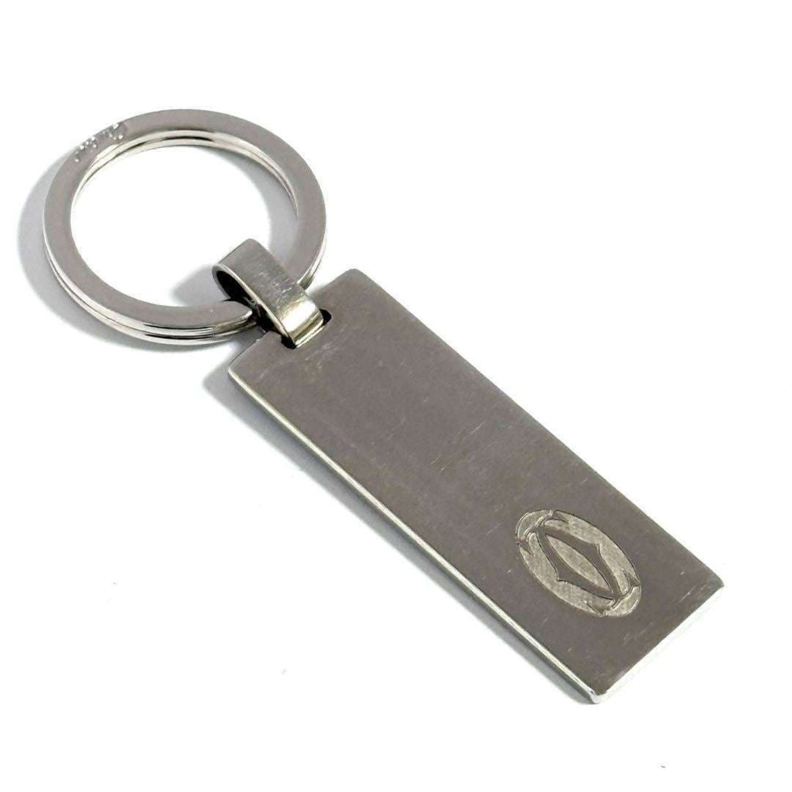 Keyring Metal Cartier: Keyring Metal Cartier Cartier metal keyring, a sleek accessory made from metal, bearing a signature. This keyring is a type of accessory, designed for everyday use. Made from metal, it is a simple yet