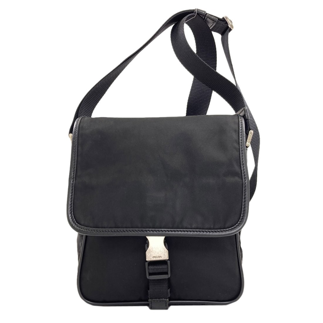 Shoulder Bag Nylon Prada Hardware Logo: Shoulder Bag Nylon Prada Hardware Logo Black PRADA Nylon Shoulder Bag with Push Lock Closure. This 9.1 inch tall, 7.5 inch wide bag features a sleek design and durable nylon exterior. The bag's