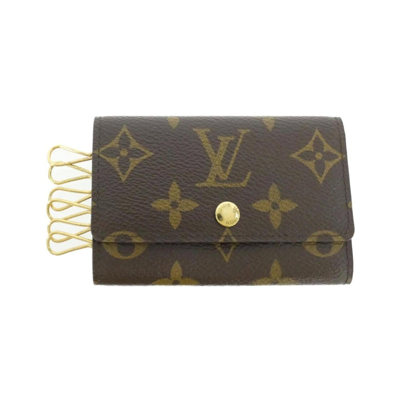 Coated Canvas Keycase Louis Vuitton: Coated Canvas Keycase Louis Vuitton Coated canvas keycase with a classic Louis Vuitton design, featuring a timeless monogram pattern in marron. The compact size and 6 key hooks make it a practical acc
