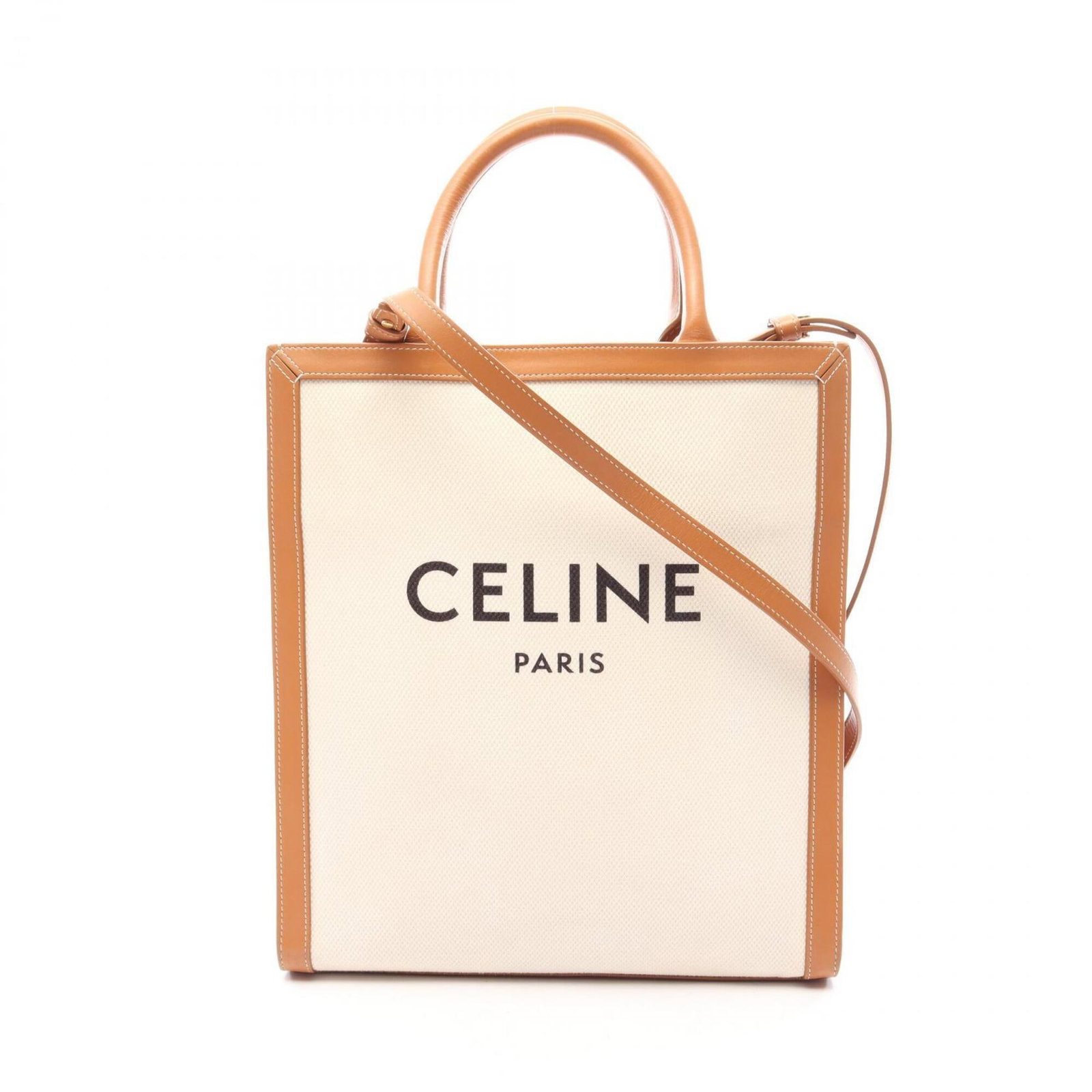 Canvas leather handbag tote Celine: Canvas leather handbag tote Celine Canvas and leather combine in a timeless design, with a classic brown and ivory color palette. The bag's clean lines and structured shape make it a versatile and
