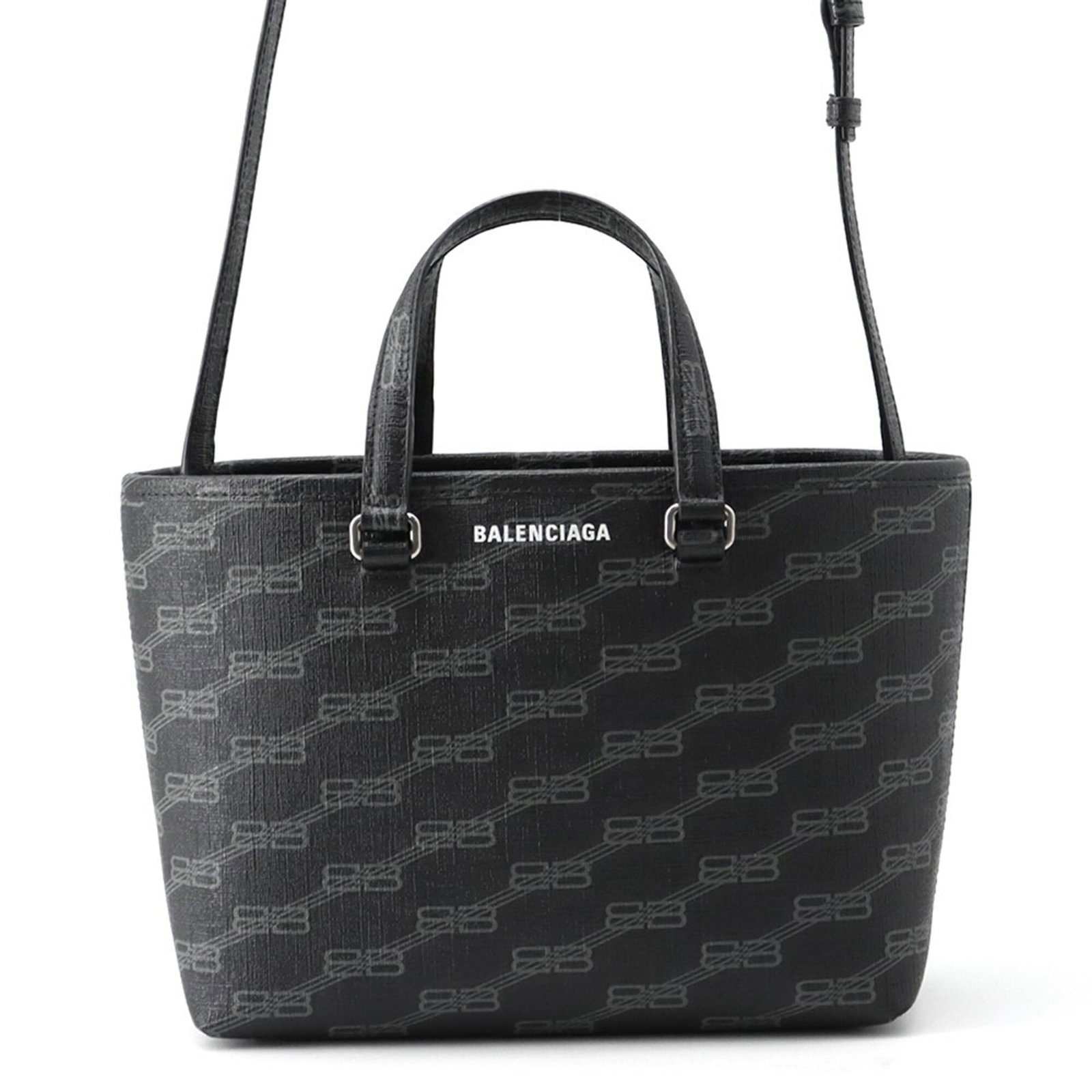 Balenciaga Handbag: Balenciaga Handbag Black Balenciaga handbag with silver hardware, measuring 19cm x 23.5cm x 10.5cm, designed for women. This Italian-made bag features a sleek and modern design, perfect for everyday
