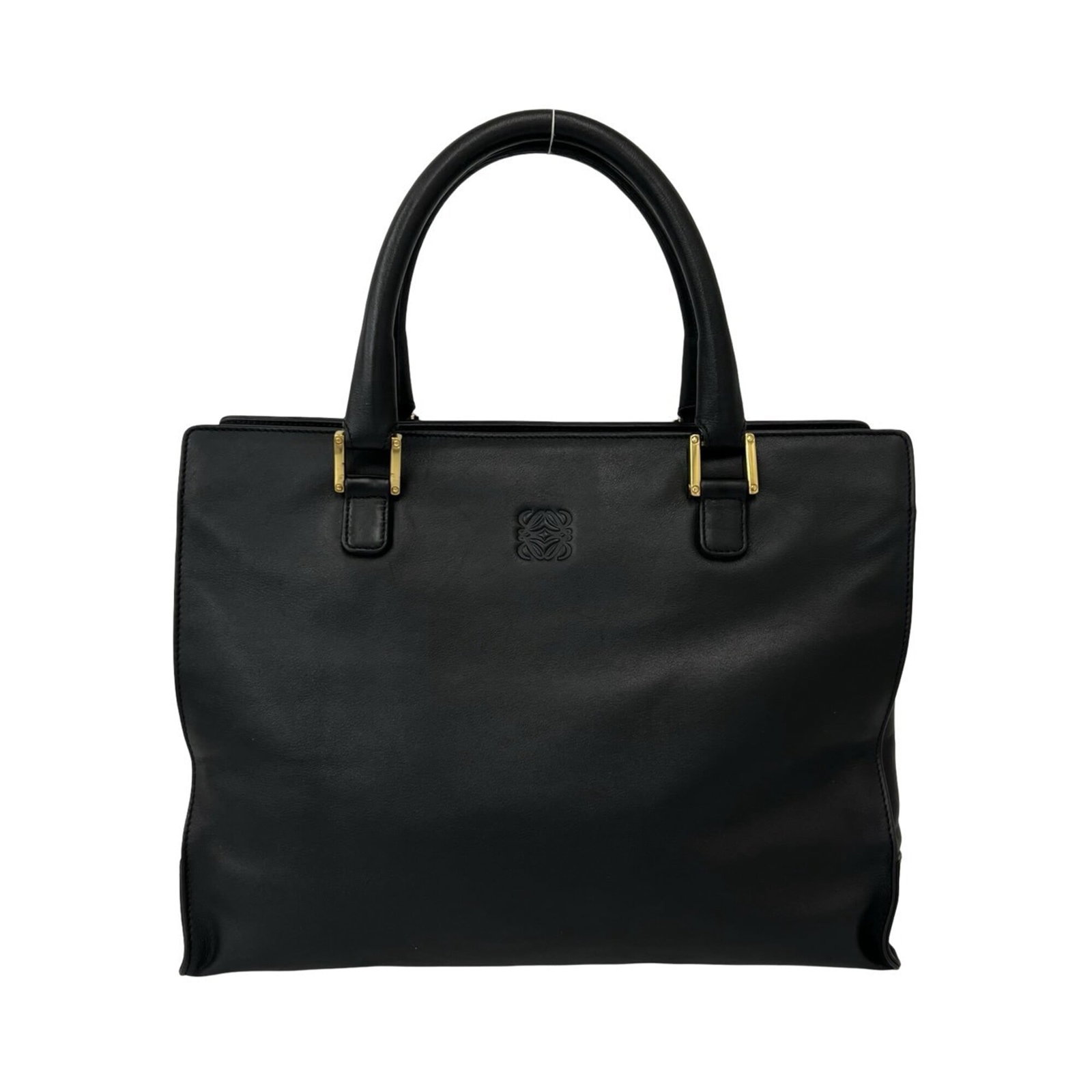 Loewe Tote Bag Leather Handbag: Loewe Tote Bag Leather Handbag Black leather tote bag from Loewe, measuring 24.5cm x 32cm x 10cm, offering a sleek and structured design. This classic handbag features high-quality leather