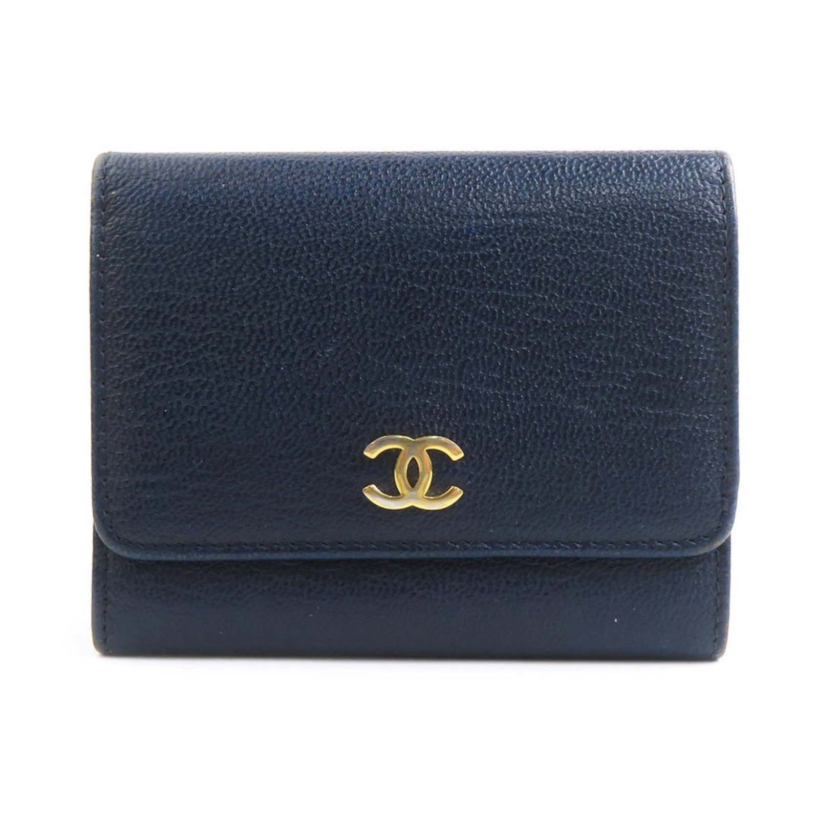Chanel Wallet (Tri-Fold) Leather: Chanel Wallet (Tri-Fold) Leather Navy leather tri-fold wallet from Chanel, featuring a classic design with clean lines and minimal embellishments. Made from high-quality leather, this wallet measures