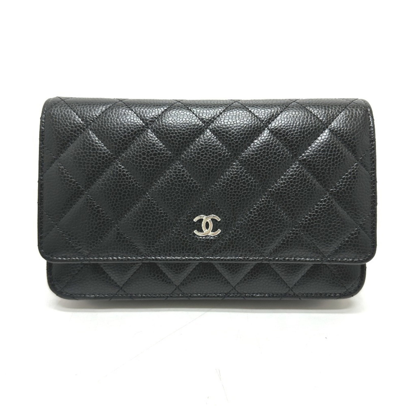 Caviar Leather Chanel Shoulder Bag: Caviar Leather Chanel Shoulder Bag Caviar leather Chanel shoulder bag in black, featuring silver hardware and a dust bag for protection. This stylish bag measures 12cm x 19cm x 3cm and offers a sleek,