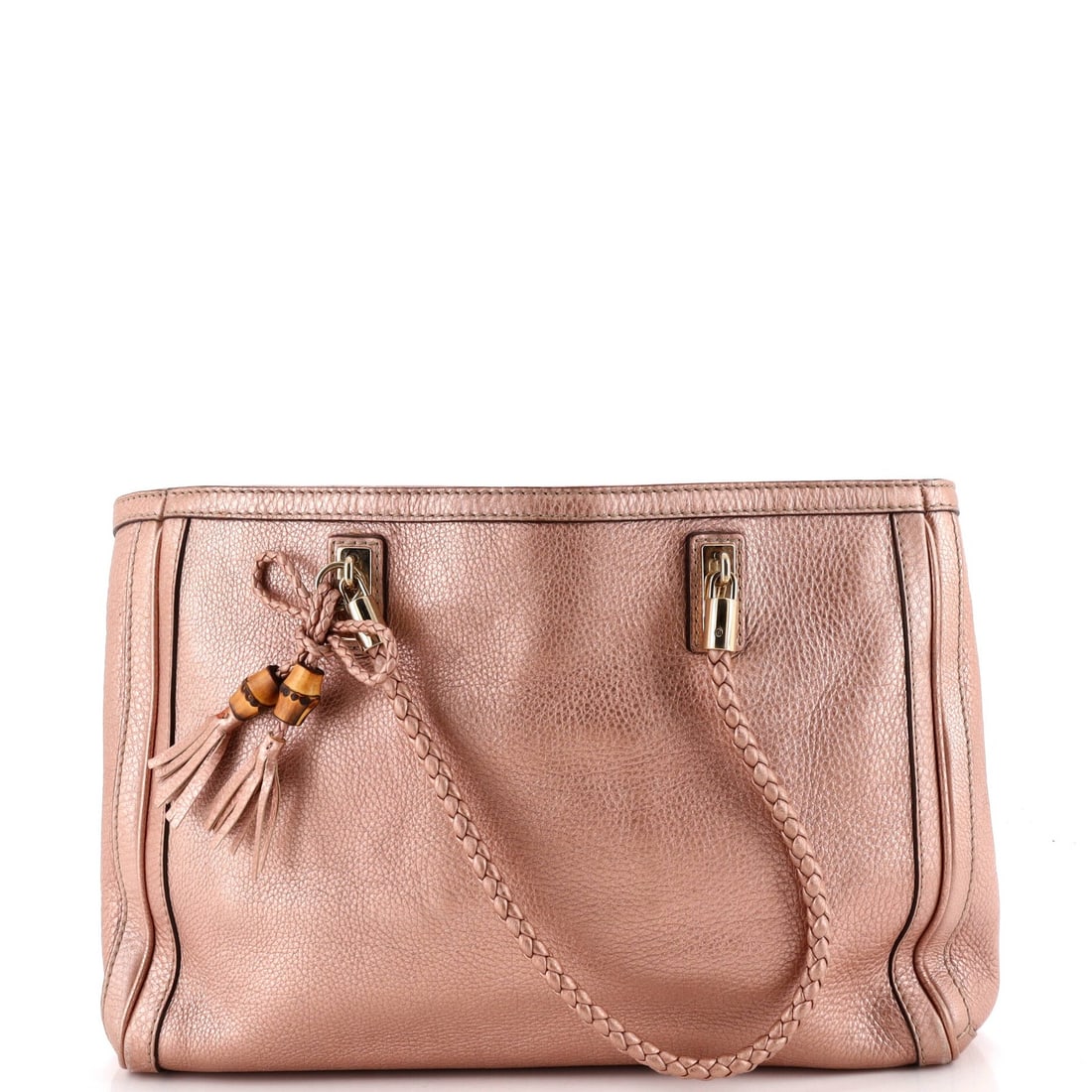 Leather medium Gucci Bella Tote: Leather medium Gucci Bella Tote Heavy corner wear, scuffs, and creases adorn this metallic leather Gucci Bella Tote, adding a worn, vintage charm to its medium size. The gold hardware and pink