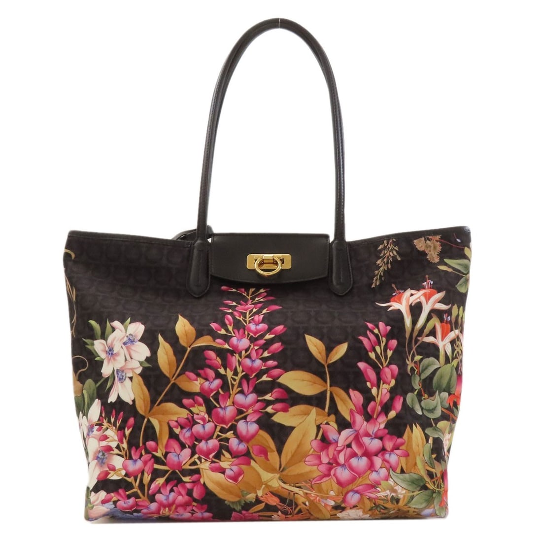Ferragamo Motif Flower Nylon Tote Bag Gancini Salvatore: Ferragamo Motif Flower Nylon Tote Bag Gancini Salvatore Black Ferragamo Motif Flower Nylon Tote Bag with Gancini Salvatore detail. This black nylon tote bag features the iconic Ferragamo Motif Flower 