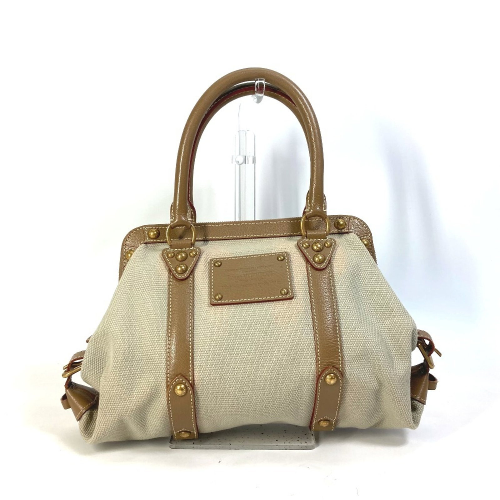 Canvas Leather Shoulder Bag Handbag Louis Vuitton: Canvas Leather Shoulder Bag Handbag Louis Vuitton Canvas Leather Shoulder Bag Handbag Louis Vuitton - A Timeless Beige Classic.This Louis Vuitton M48827 shoulder bag features a striking beige canvas