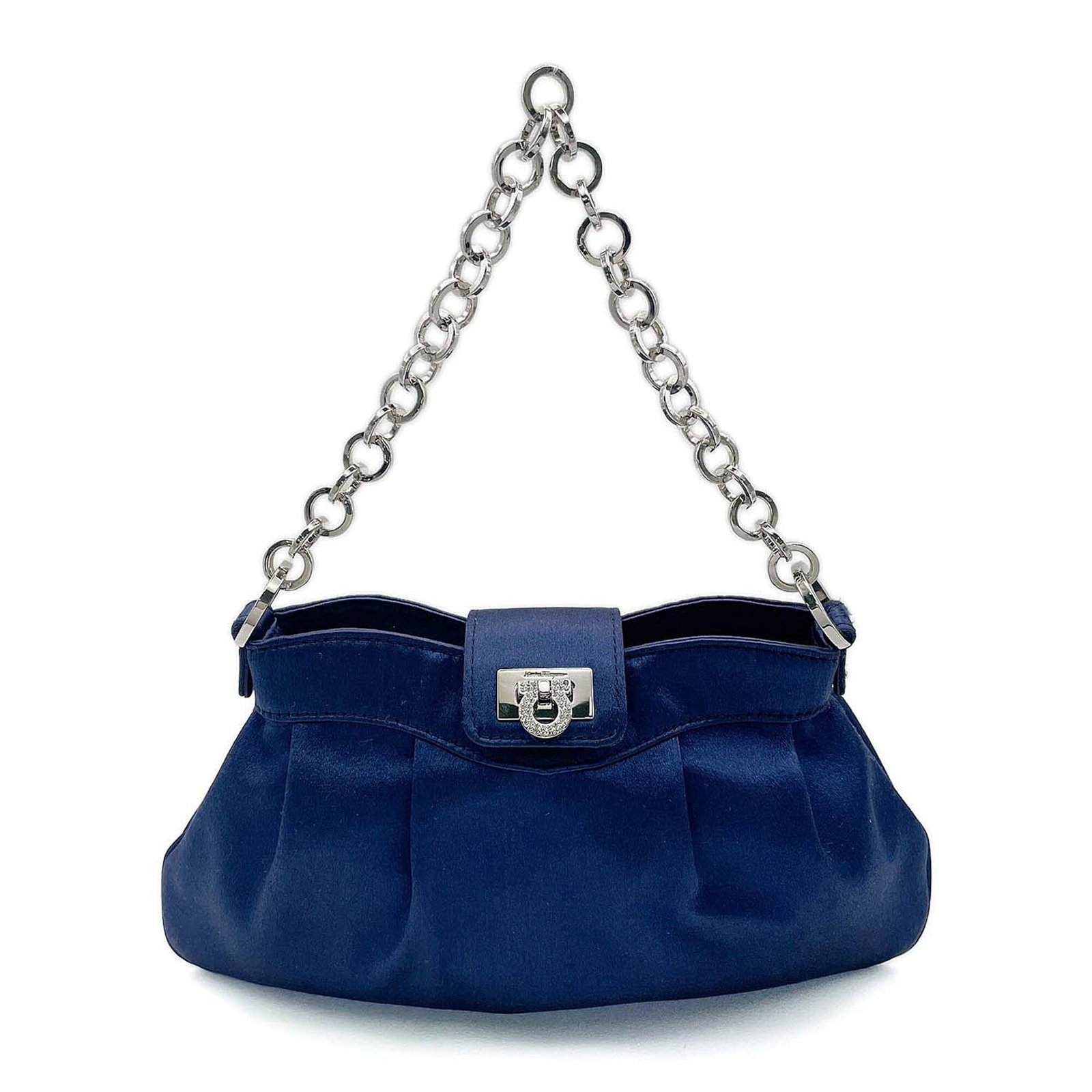 Satin Metal Pouch Handbag Salvatore Ferragamo: Satin Metal Pouch Handbag Salvatore Ferragamo Satin Metal Pouch Handbag Salvatore Ferragamo boasts a striking blue hue, adorned with rhinestone and satin details. This elegant pouch measures 12cm x
