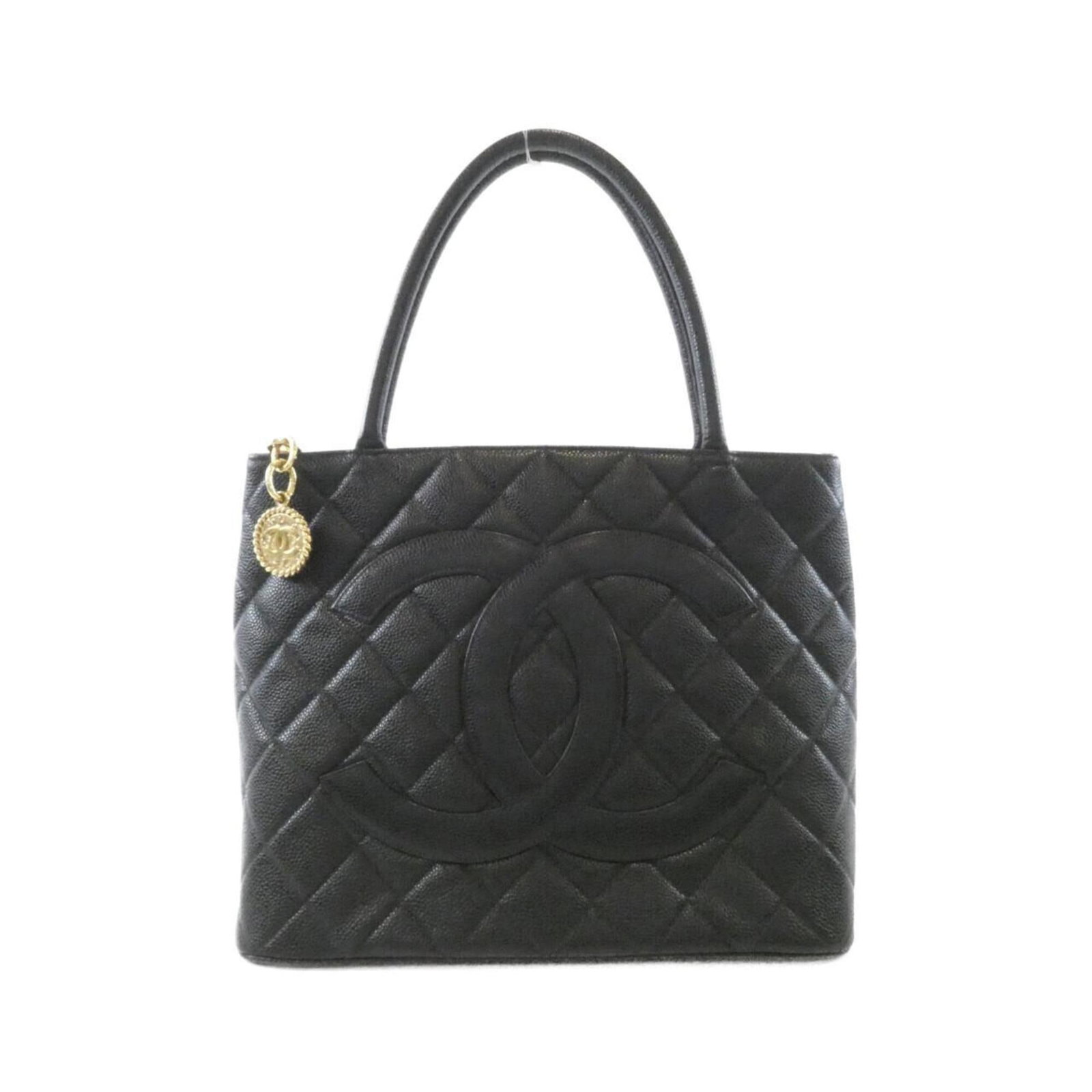 Calfskin Handbag Chanel: Calfskin Handbag Chanel Calfskin Handbag Chanel features a sleek black design made from high-quality Grained Calfskin, with a size of 25cm x 30cm x 14cm. The bag's classic style and timeless elegance