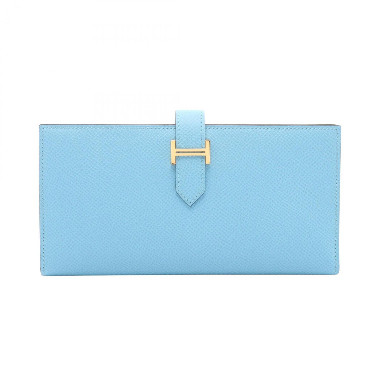 Epsom Leather Bi fold Wallet Hermes: Epsom Leather Bi fold Wallet Hermes Epsom leather, a luxurious material, is used to craft this bi-fold wallet from Hermes. The wallet's blue or green color adds a pop of style, while its compact size