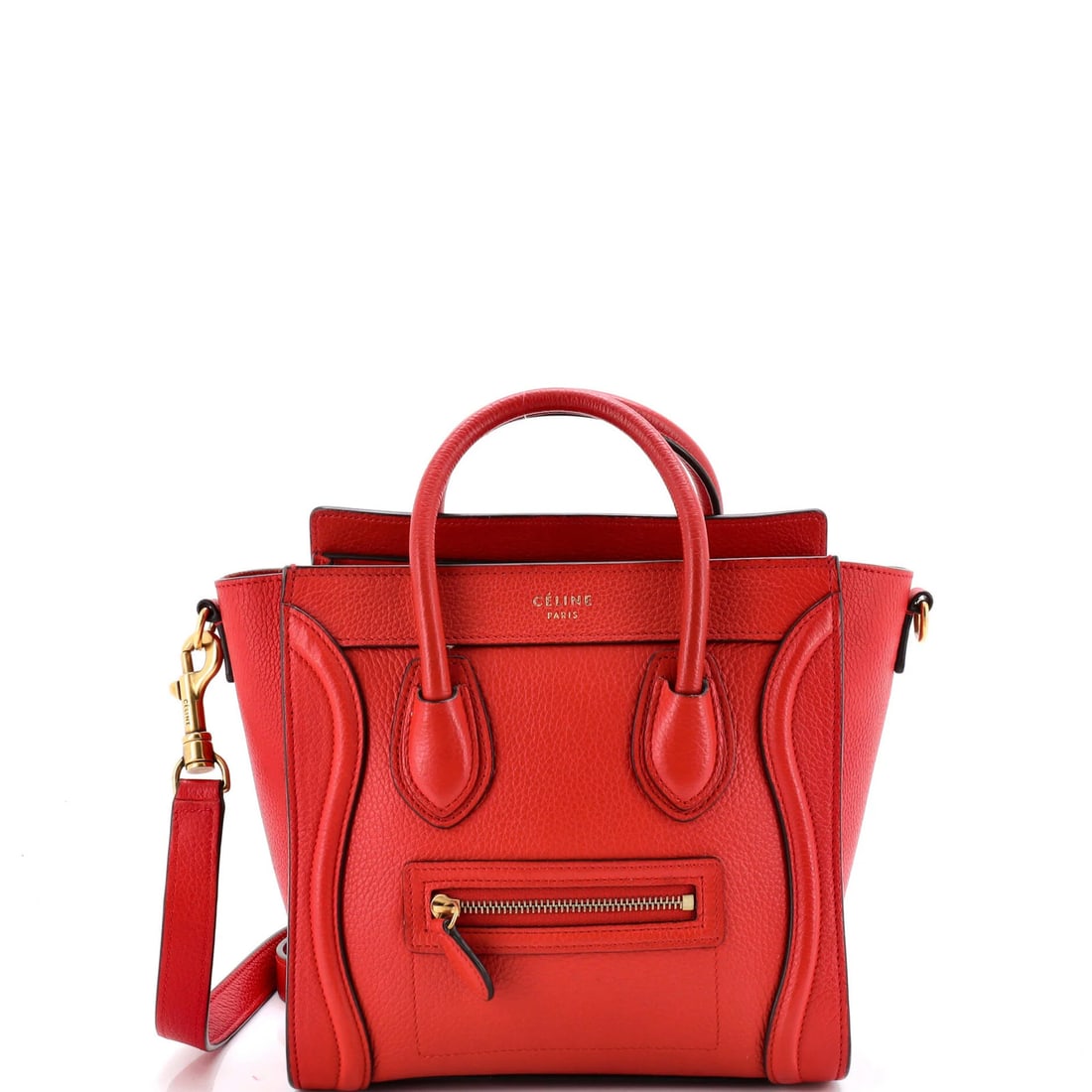 Luggage Bag Grainy Leather Nano Celine: Luggage Bag Grainy Leather Nano Celine Red Grainy Leather Nano Celine Cross Body Bag with Gold Hardware, featuring a 19" strap drop and interior made of microfiber. The bag has a classic nano size wit