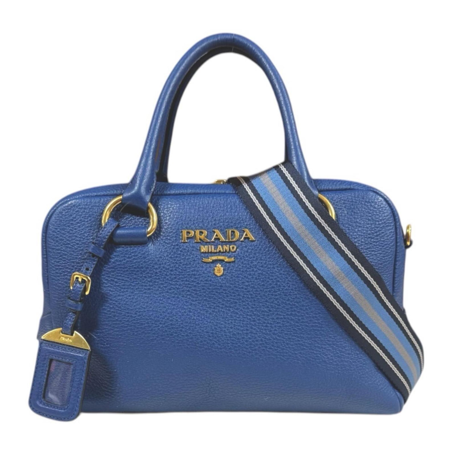 Shoulder Bag Leather Prada: Shoulder Bag Leather Prada The Prada Country shoulder bag is a stylish and functional leather tote, featuring a blue color and a zipper closure. Made from high-quality leather, this bag measures 20cm 